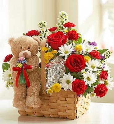 Lotsa Love for Romance Lotsa Love for Romance - Send that special someone three times the delight by giving our stunning fresh flower arrangement, plush bear and delicious candy! (Bear style may vary) Item # 16992