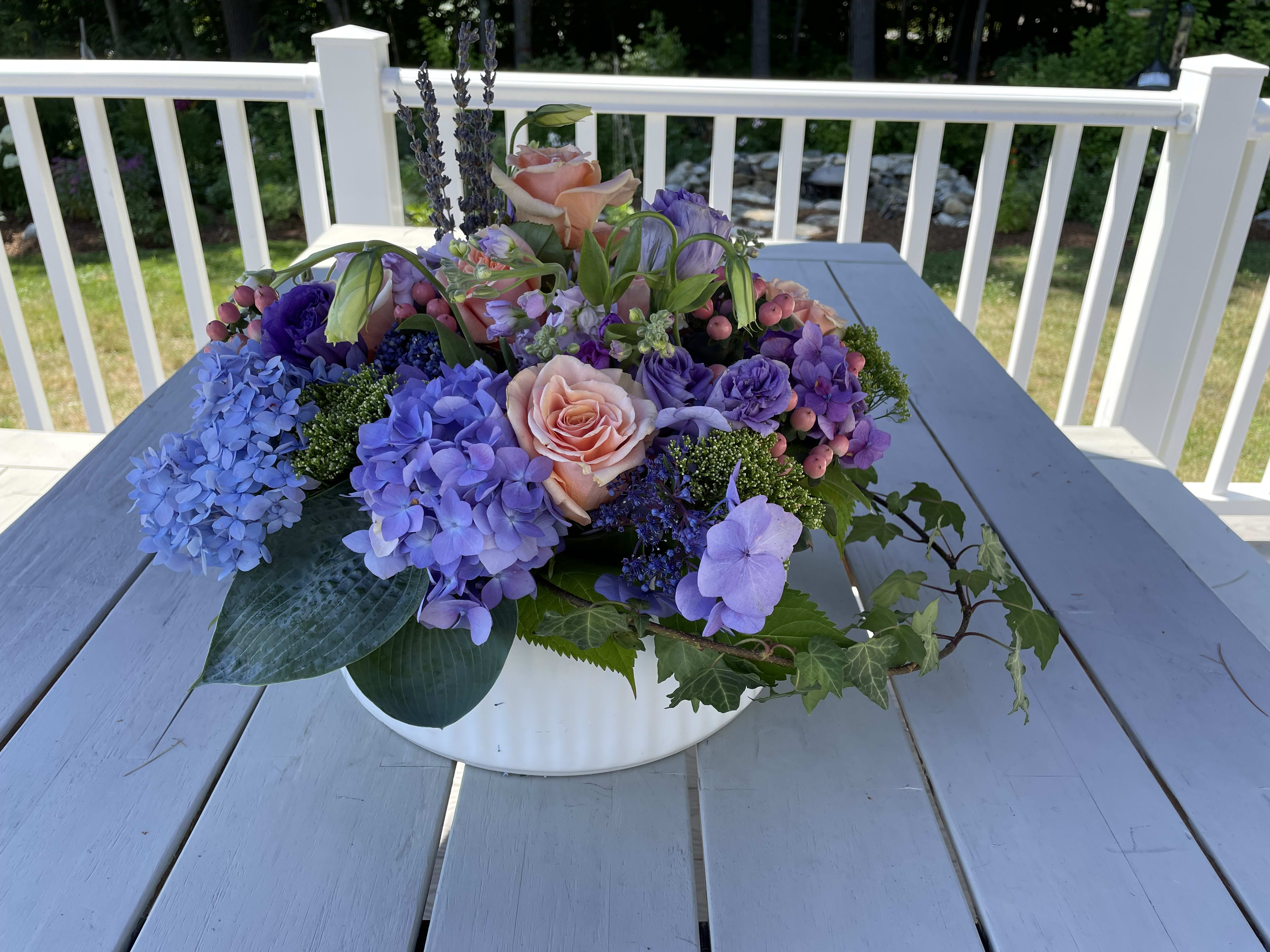 elegant garden arrangement any occasion elegant garden arrangement any occasion - large colorful arrangement filled with roses, hydrangea, peonies with added peach and lavender flowers in a 12" round glass container. This arrangement is a WOW. Your preference of colors are also available
