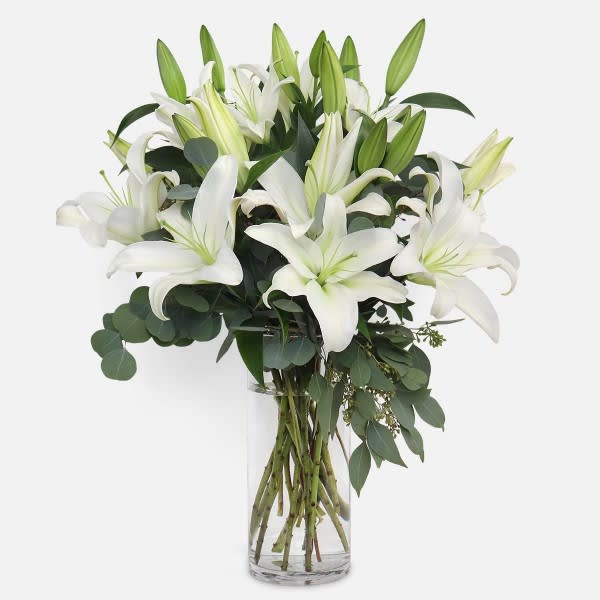 Peaceful Lilies - A lovely bouquet of Casablanca lilies and eucalyptus to soothe and comfort.  