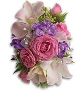 Purple Love Wristlet Purple Love Wristlet - A luxurious array of purple, pink and white blooms on a faux pearl cuff. Pink dendrobium orchids and spray roses, with hints of purple stock, pink waxflower, ming fern and seeded eucalyptus on a faux pearl cuff. Approximately 4" W x 5 1/2" H Orientation: N/A