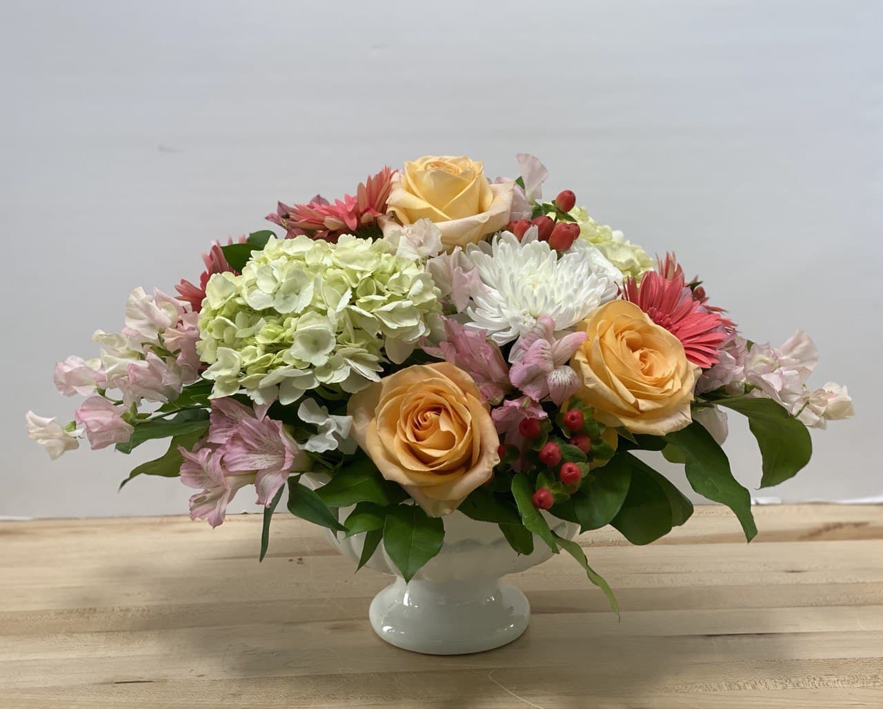 Calmness - This complimentary blend of colors in this centerpiece will bring cheer to all who view it. Suitable for any occasion.