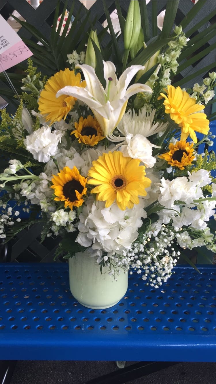 Sun Happy  - Send some sunshine with this bright mix of sunflowers, gerber daisy, hydrangea and much more! 