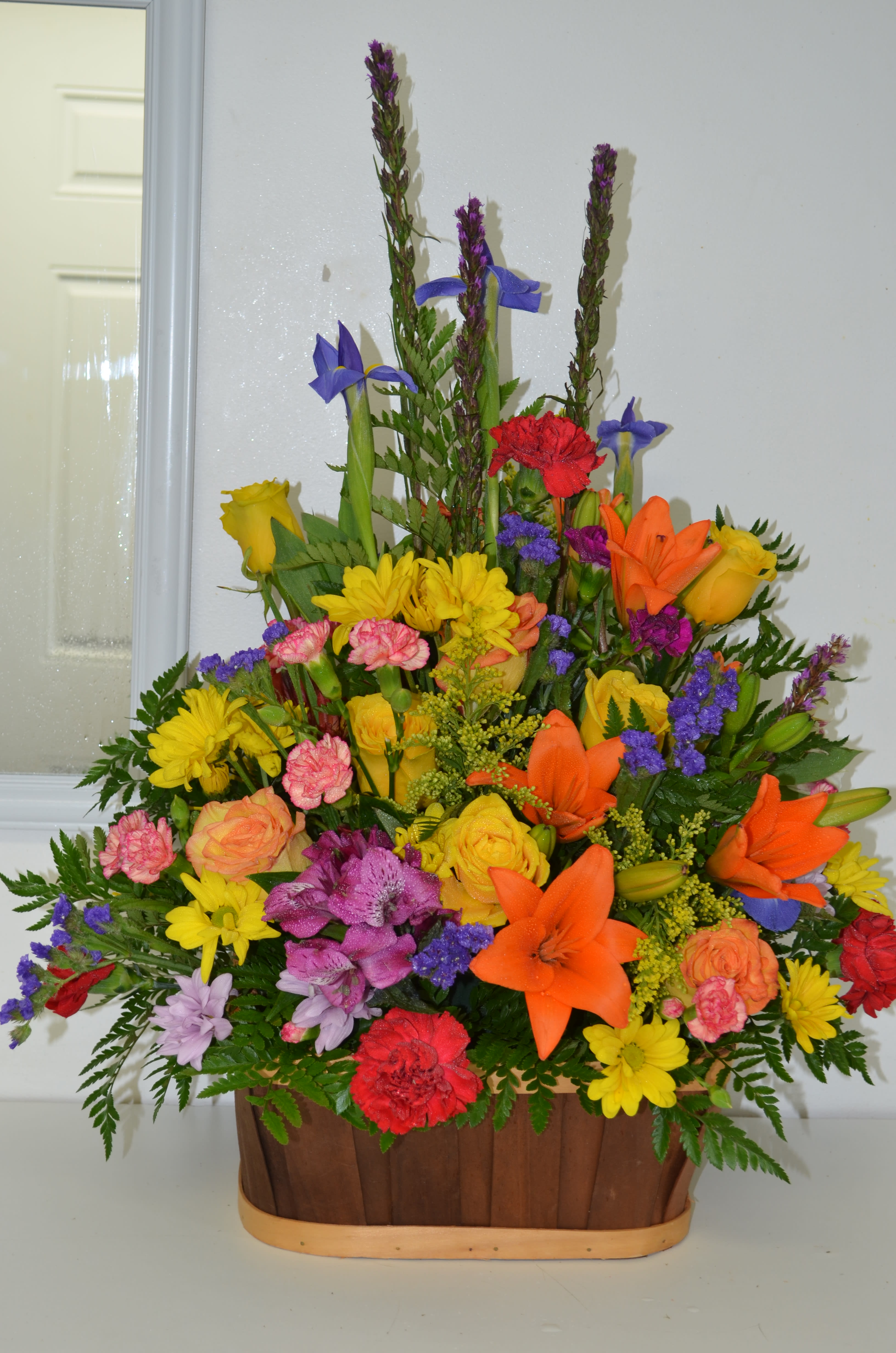 Orange Lilies Orange Lilies - Basket of bright and cheerful colors of all occasions.