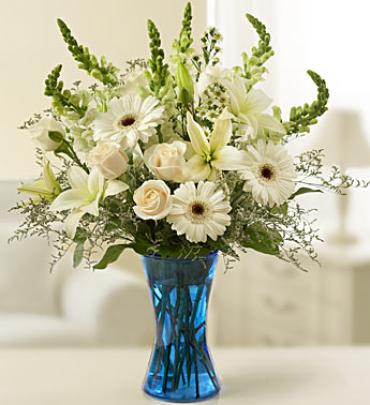 Tableside Sympathy Arrangement in White -  Our radiant, all-white bouquet conveys your deepest sympathies with elegance, beauty, and grace. (Vase/Basket style may vary)    Item # 17819 