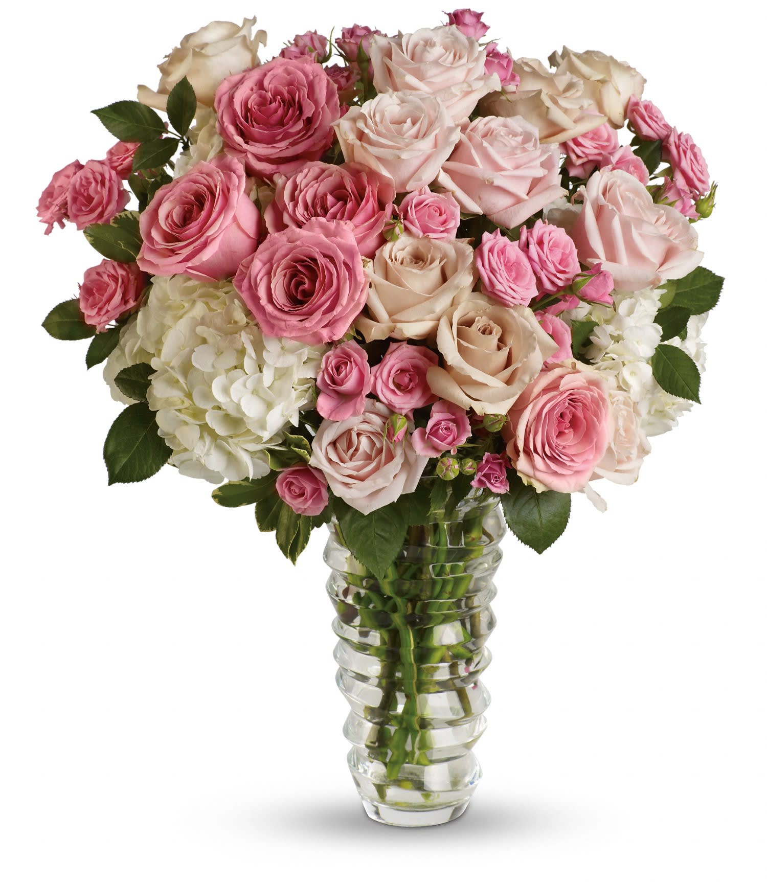 Luxe be a Lady by Teleflora - This gorgeous bouquet includes white hydrangea, light pink roses, pink roses, crÃ¨me roses, pink spray roses and variegated pittosporum. Delivered in a beautiful glass vase. Approximately 18&quot; W x 21 1/2&quot; H    TRS06-1A