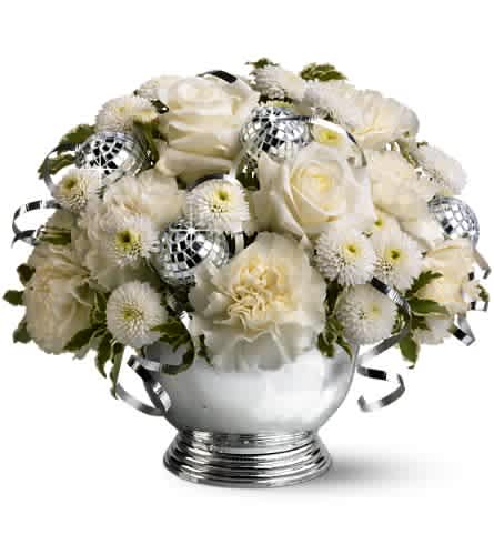 Studio 54 - For a super-chic disco celebration this New Year's, send this fun, fabulous floral display! With its mix of pure white flowers, tiny mirrored disco balls and curling silver ribbons, this bowl of blossoms is the hippest gift in town.    A mix of fresh white flowers such as roses, carnations and button spray chrysanthemums is accented with miniature disco balls and silver ribbons and delivered in a silver-toned bowl.    Approximately 9&quot; (W) x 8&quot; (H)    Orientation: All-Around    As Shown : TFWEB291
