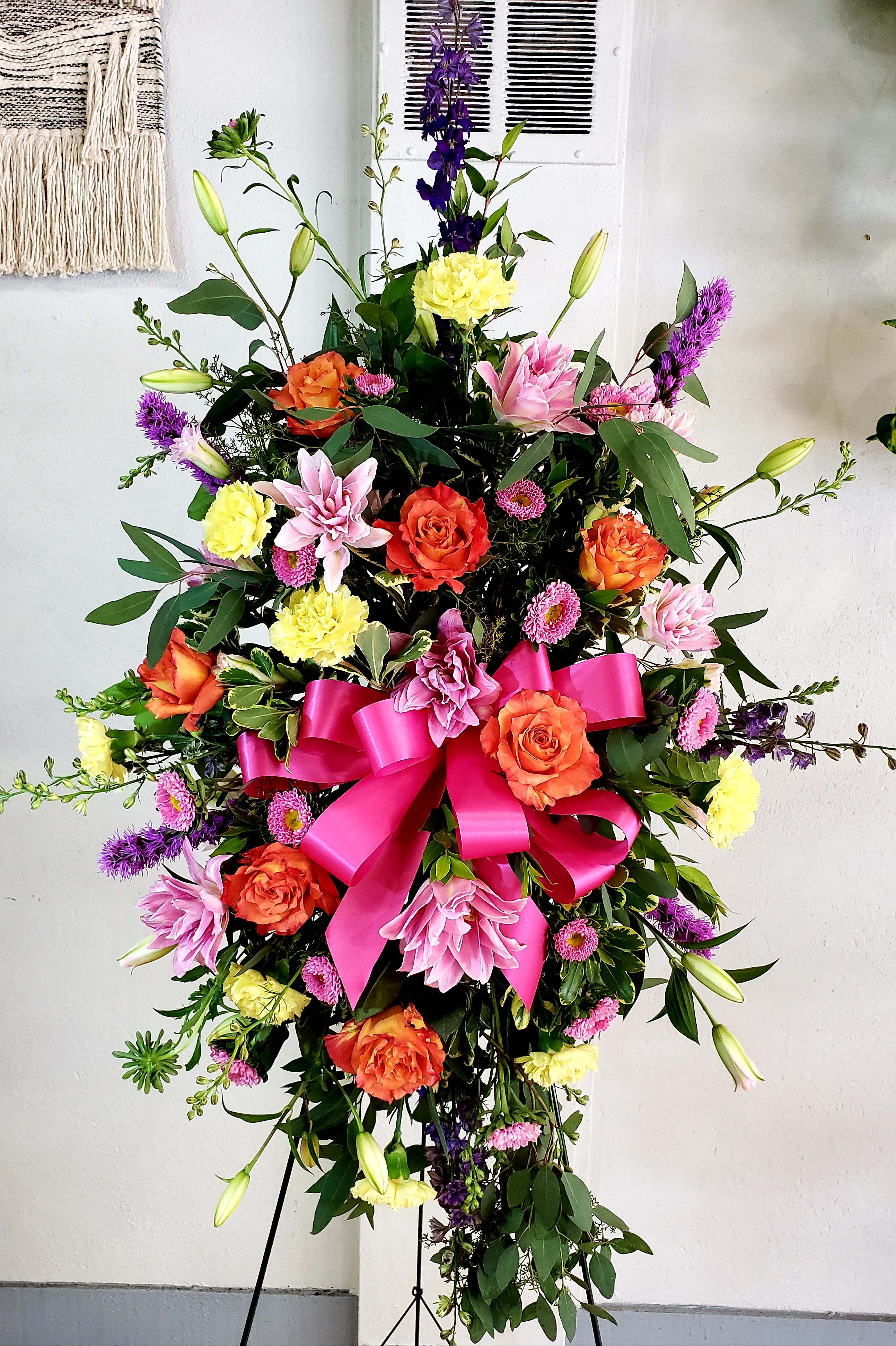 Light The Way Tribute Spray Light The Way Tribute Spray - Colorful garden flowers in soothing shades to express your heartfelt sympathy.