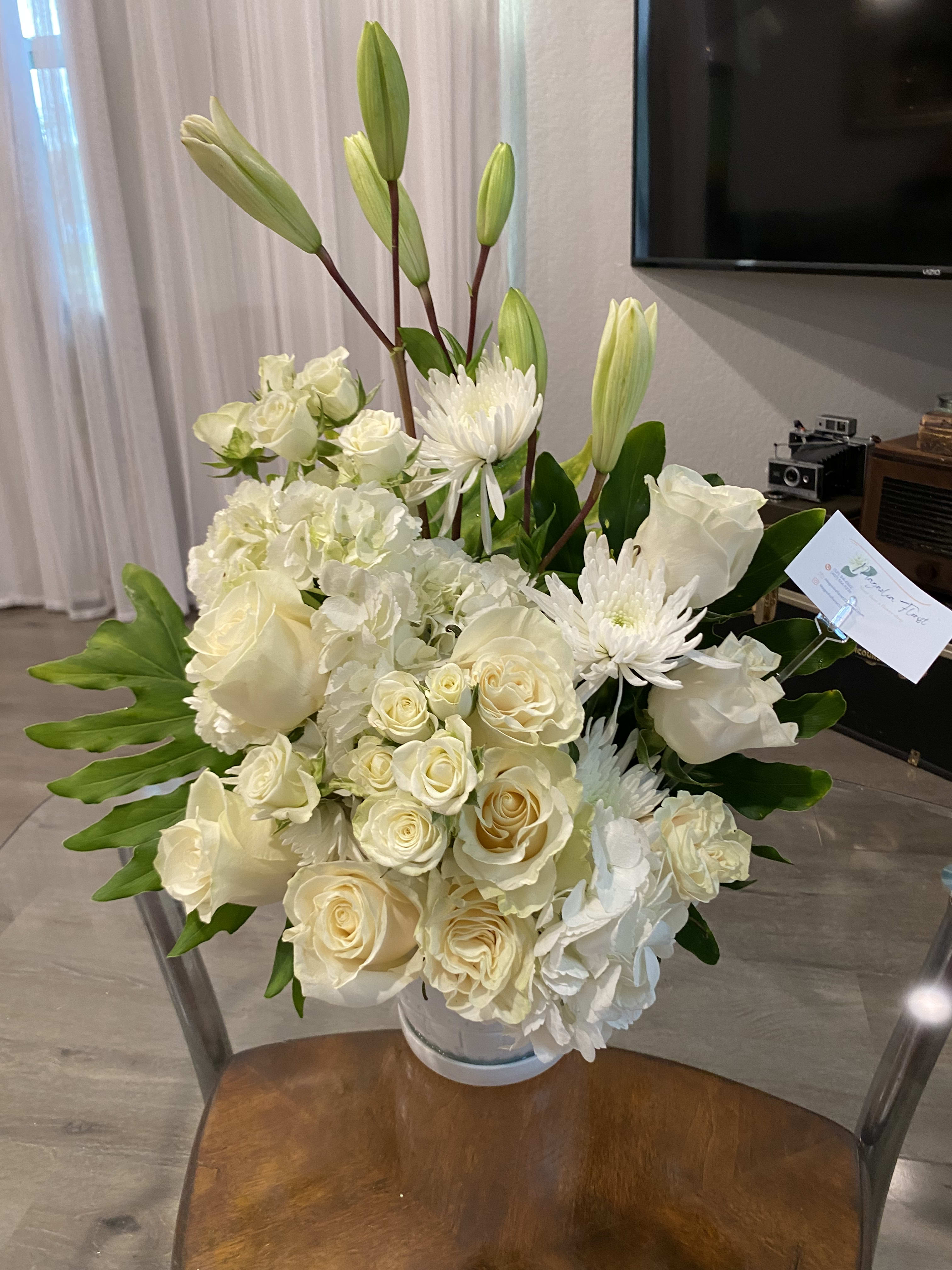 Funeral flower arrangement  - Funeral arrangement, made with hydrangeas, roses, spray roses, lilies, Chrysanthemums and greenery