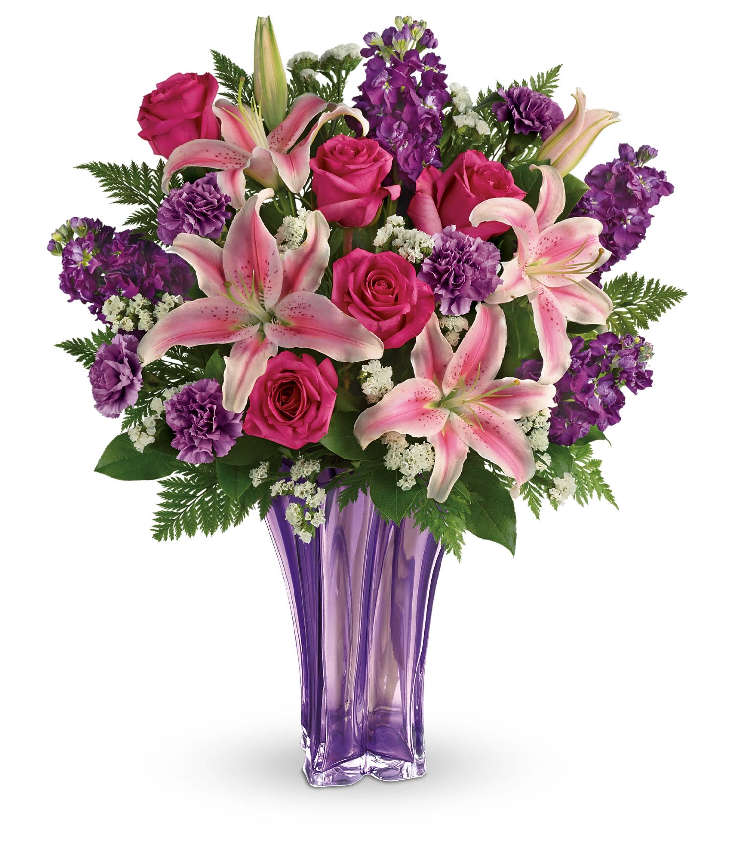 Luxurious Lavender Luxurious Lavender - This arrangement includes pink roses, pink oriental lilies, purple carnations, white sinuata statice, leatherleaf fern, and lemon leaf. Delivered in a Luxurious Lavender vase. Approximately 20 1/2 W x 24 H TEV49-1A