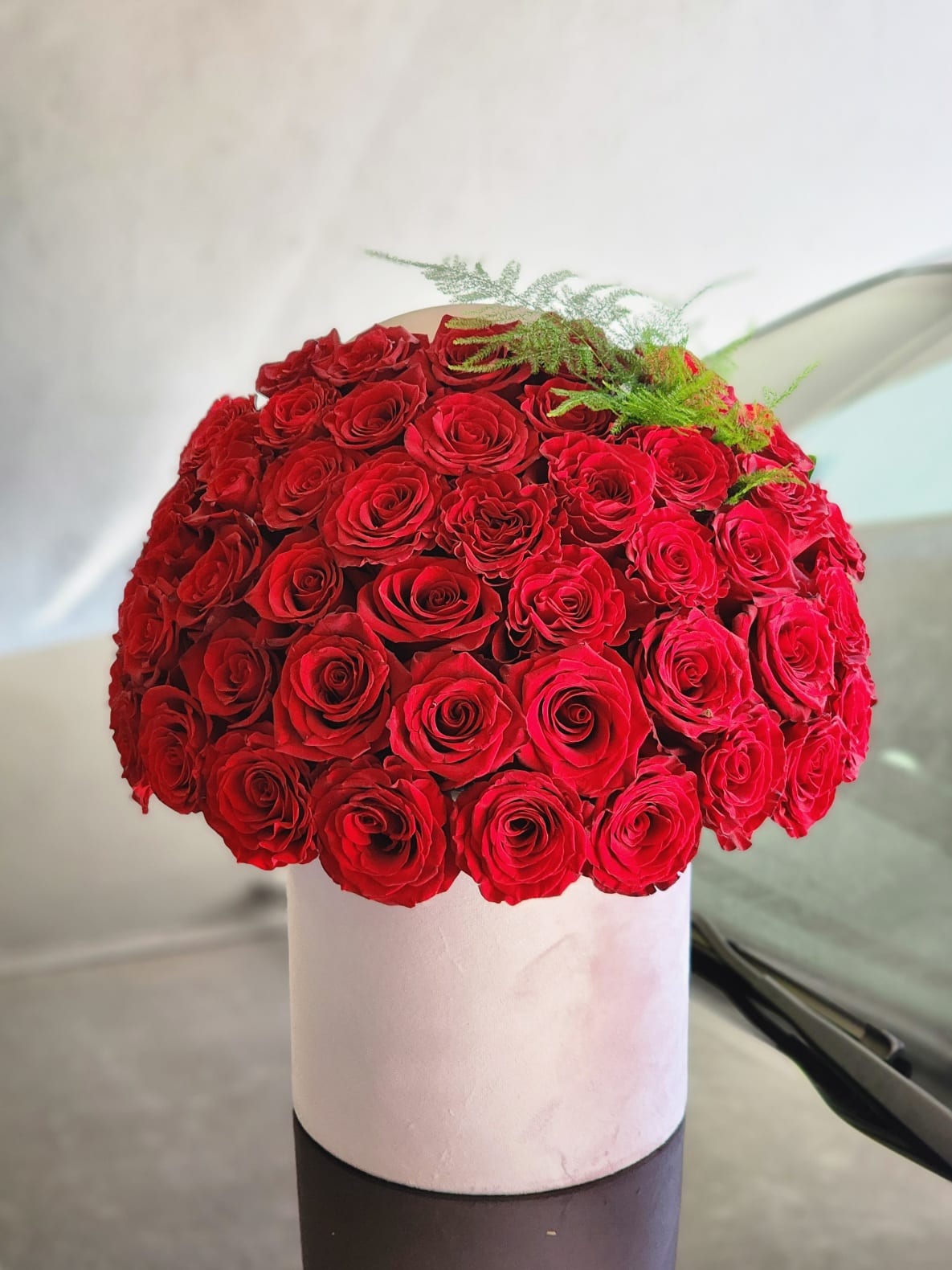 Deep Love - A floral arrangement of 50 red roses typically signifies deep love, passion, and affection. Red roses are often associated with romance and are a classic symbol of love 