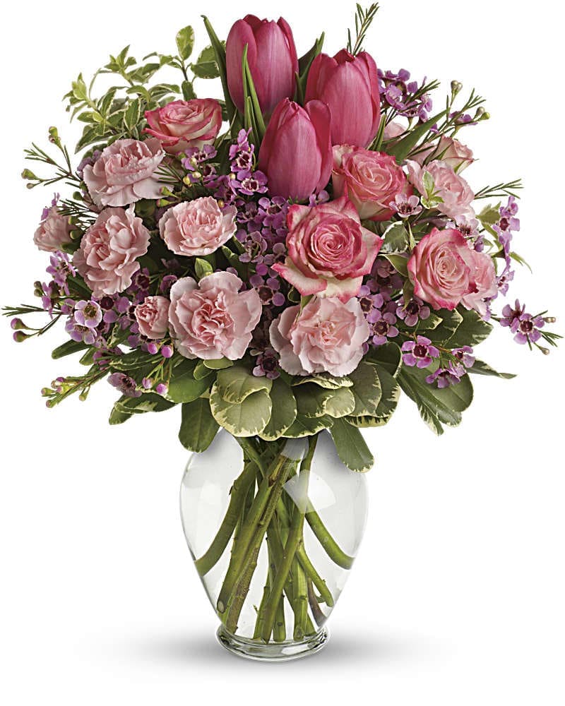 Full Of Love Bouquet - It's beauty-full! Bursting with tantalizing tulips and radiant roses, this delightful pink arrangement brings spring joy to that special someone. Includes pink roses, tulips, carnations and waxflower, accented with fresh pitta negra and variegated pittosporum.