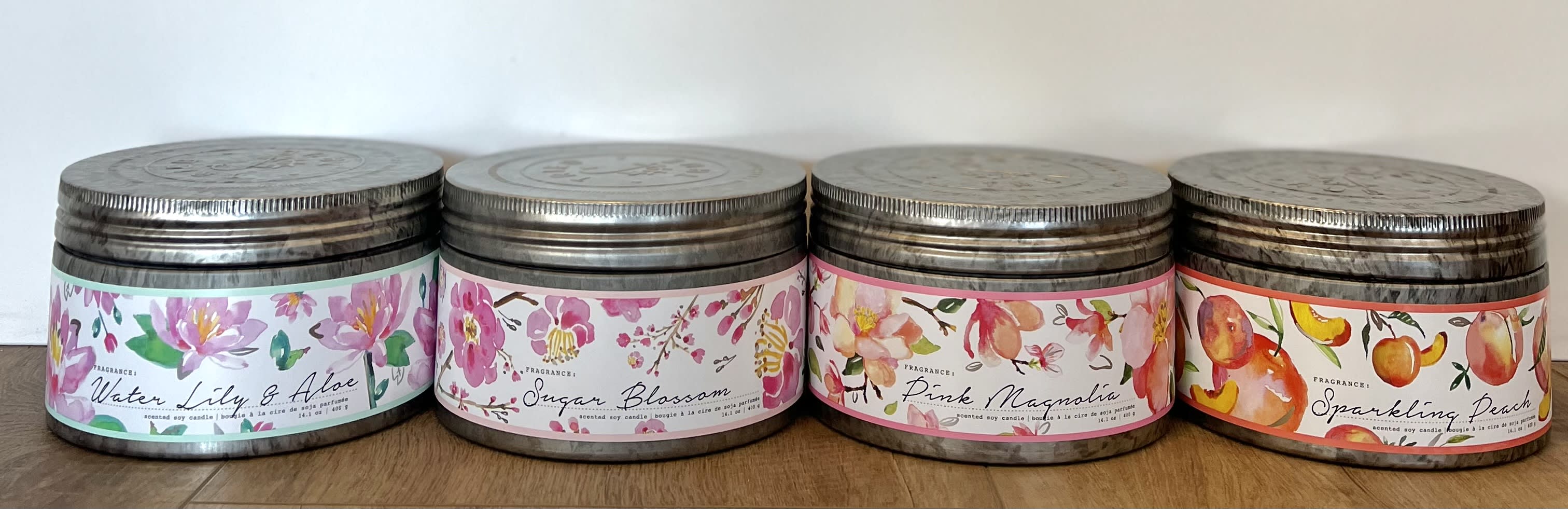 Illume Soy Candle 14 OZ - Another candle option we highly recommend, you can't go wrong with either option. They all smell amazing.  Scent options -  Sugar Blossom Water Lily and Aloe Sparkling Peach Pink Magnolia  