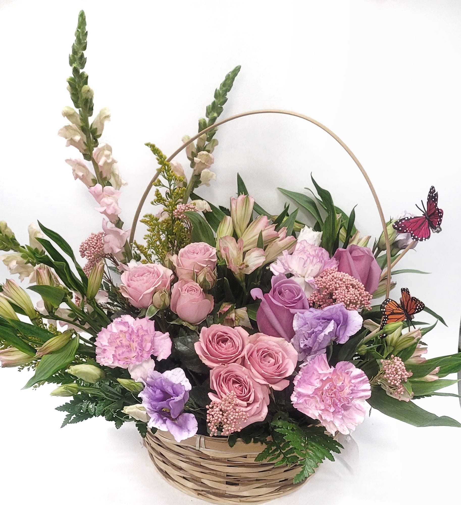 Garden Queen Garden Queen - Garden basket filled with roses, snapdragons and carnations for the Queen in your heart.