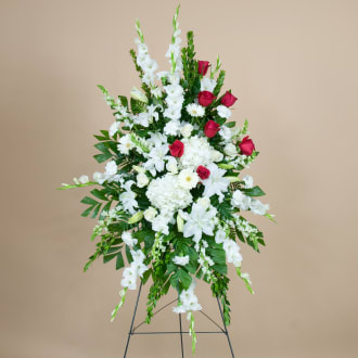 Red &amp; White Standing Spray - A standing spray consisting of snapdragons, gladiolas, roses, carnations, hydrangeas, gerbera daisies, lilies and a grouping of red roses.