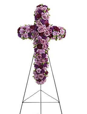 Deepest Faith Cross - A breathtaking standing cross of majestic purple and lavender blooms remembers and honors the departed with a meaningful and moving expression of faith, admiration and divine love.