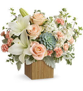 Desert Sunrise Bouquet - Teleflora - Peaceful yet energizing, this unforgettable arrangement of desert-hued blooms and succulents in a sleek bamboo cube is a chic gift on any special occasion.  Roses and tiger lilies with other beautiful flowers make this a fantastic item.
