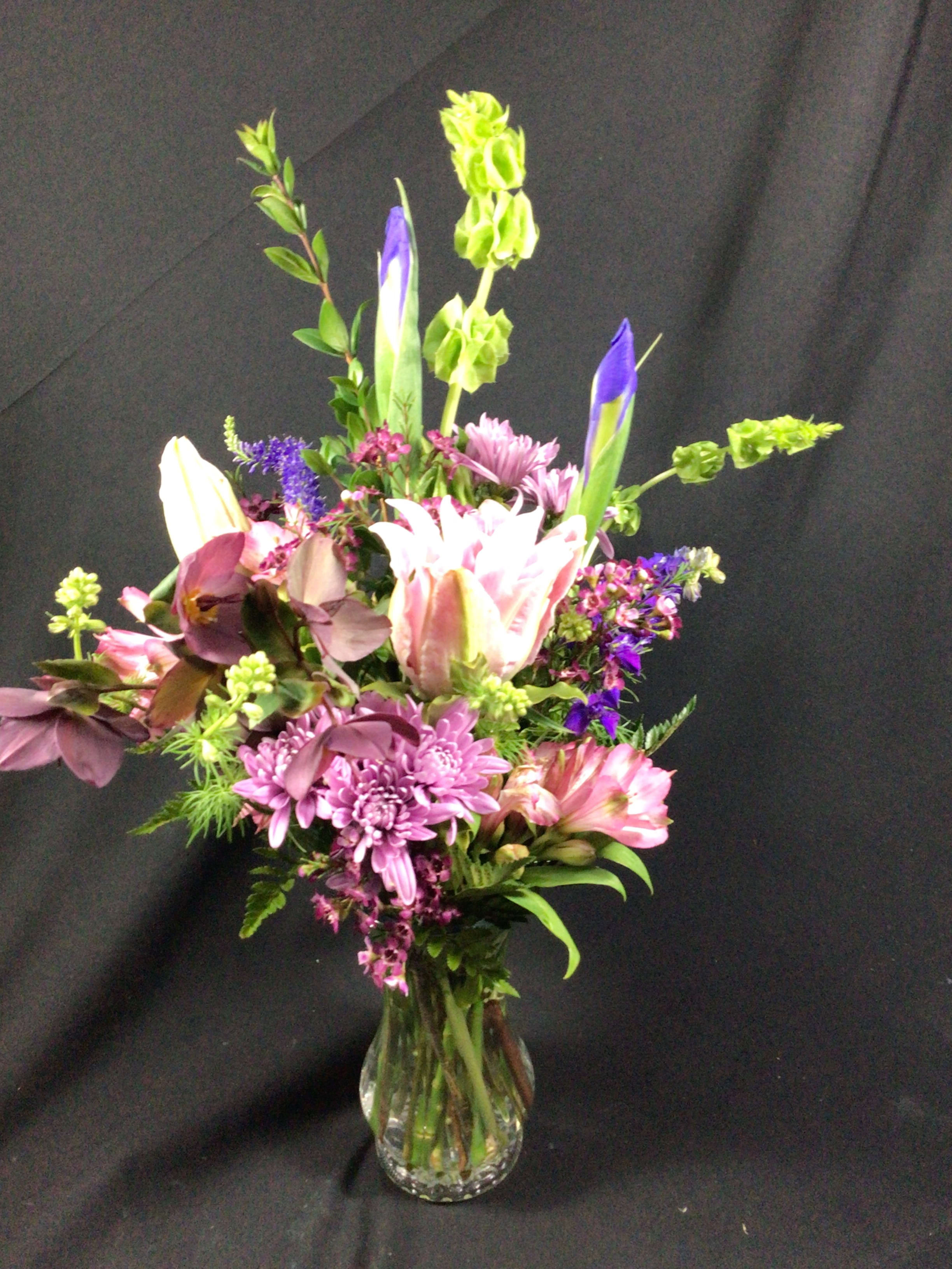 Tall and Showy Deal of the Day! - Send a Smile, Brighten the Day, Say, I Love You! Many reasons to send flowers but You're not sure what is going to be the best way...Flowers can say it for You. Our Tall DEAL of the DAY! is perfect. Let our designers create something that fits Your budget and get'er done today! Fresh seasonal flowers will be desined in a taller showy presentatio. Shown are some Examples of previous Deal of the Day! Share with our designers, possible fav color, maybe a fav flowers,