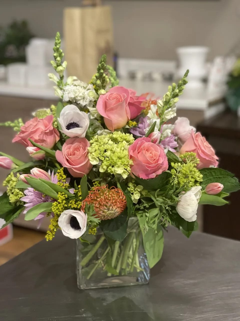 Coral Charm - roses snapdragon protea hydrangea 
