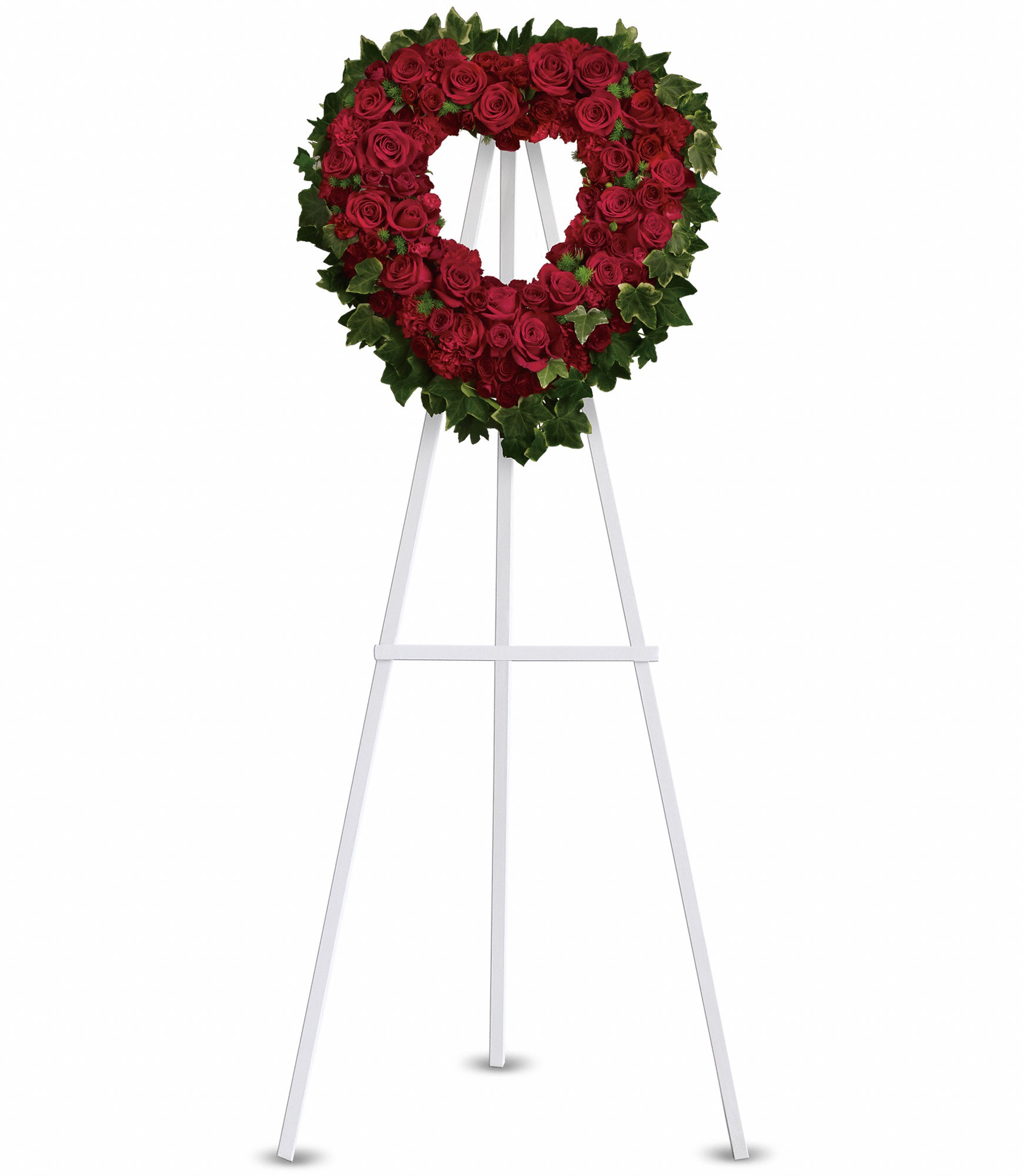 Blessed Heart - A beautiful heart is a wonderful way to share your thoughts of love.  Red roses, spray roses, carnations and miniature carnations are arranged with fern and ivy in the shape of a heart.  Approximately 23&quot; W x 24&quot; H  Orientation: One-Sided  As Shown : T225-2A