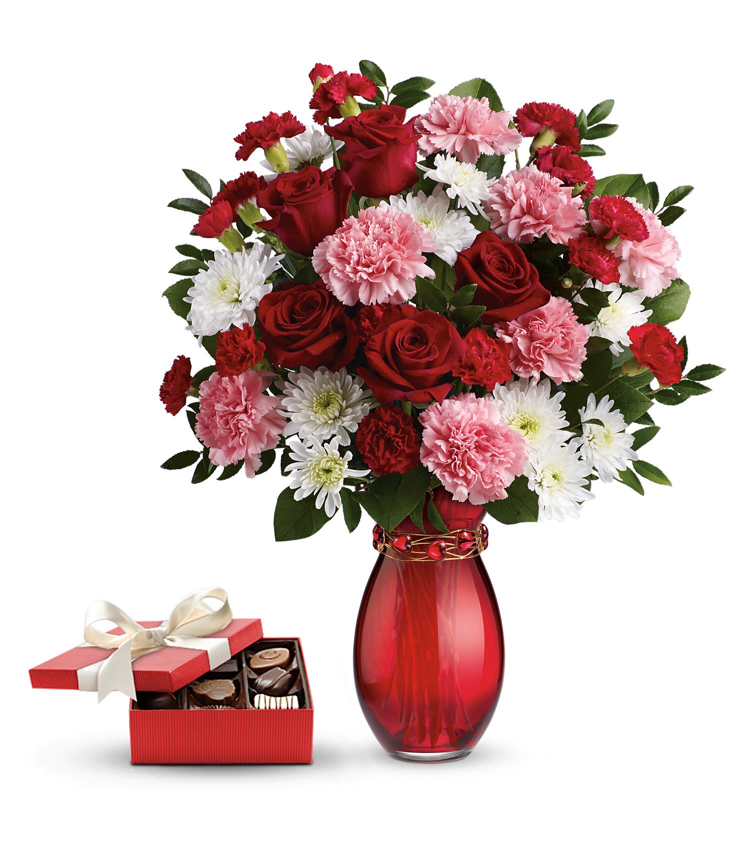 Sweet Embrace Gift Set PM Sweet Embrace Gift Set PM - This sweet gift set includes a delicious box of chocolates paired with a stunning bouquet. Embrace this Valentine's Day with beauty and romance! Nothing is sweeter than this charming 4-in-1 gift that includes a pink and red bouquet of roses, carnations and chrysanthemums hand-delivered in a stunning hand-blown red glass vase wrapped with a gorgeous adjustable bracelet made of golden wire and shimmering red hearts and a box of chocolates. It's sure to earn you an embrace or two!