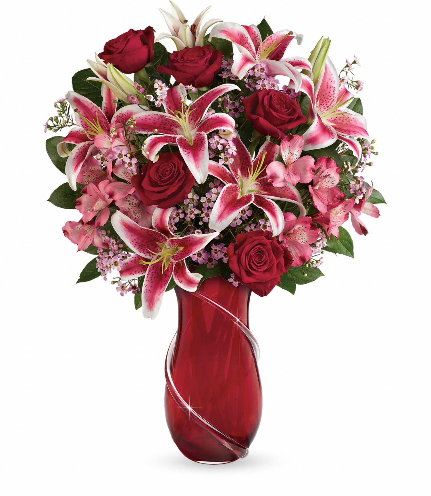 Teleflora's Wrapped With Passion Bouquet DX - The ultimate in Valentine's Day luxury! Inspired by Italian art glass, this exquisitely crafted hand-blown glass vase is a keepsake she'll treasure forever. Its graceful shape and sparkling, hand-applied glass ribbon are the perfect complement to this dramatic bouquet of romantic long stemmed red roses and fragrant pink stargazer lilies. 