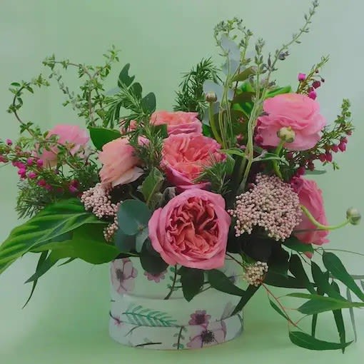 Garden in a box - This flower arrangement is the perfect gift choice for friends and family for romantic occasions or celebrations. Is a truly unique gift from Rose City Flowers, a beautiful combination of roses, rice flowers, and ranunculus.    The bouquet pictured reflects our original design for this product. While we always try to follow the color palette, we may replace stems to deliver the freshest bouquet possible, and we may sometimes need to use a different vase.    We have a simple goal – delight our customers with flowers that are high quality, fresh, and beautiful. While we may occasionally need to substitute for color or flower variety, we promise that the blooms you receive will be fresh and wow you or your gift recipient. 