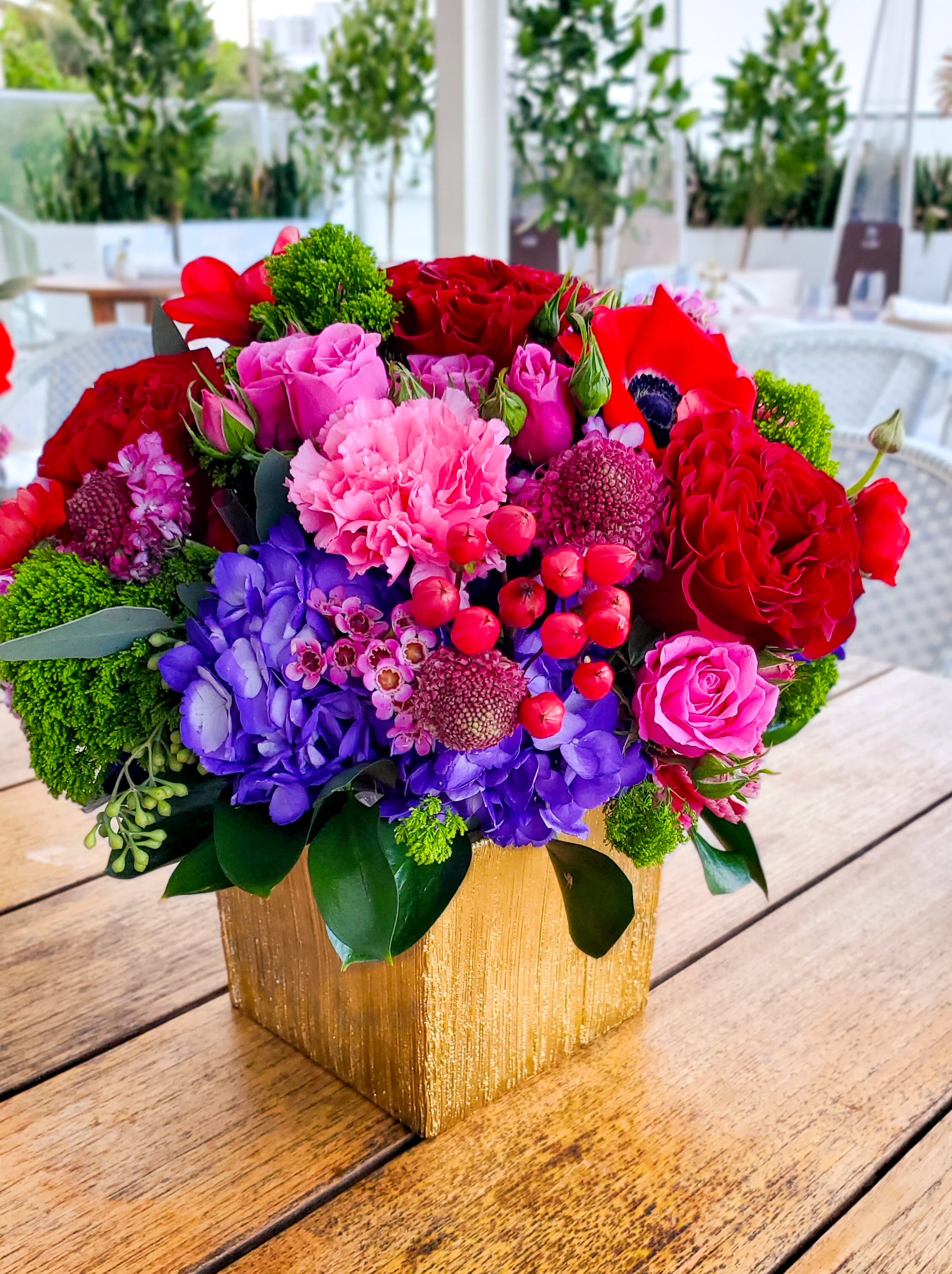 Purple artificial 2024 flowers in vase