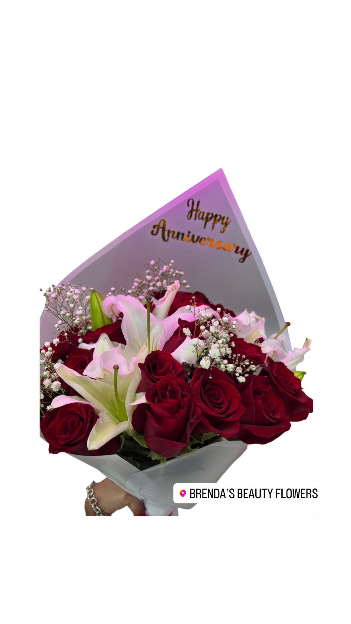 Lilies and roses  Bouquet  - STANDARD: 18 Roses and lilies  DELUXE: 25 Roses and lilies  PREMIUM: 36 roses and lilies    Introducing our new hand-tied bouquet collection, placed together with care and attention to detail. The color of the paper may vary depending on availability.  The letters you can add Happy Birthday , I love you , thank you , congratulations, happy anniversary or a name . Just  let us know what would you like the wrapping paper to say.  Fresh long stem Roses from Ecuador  With Oriental lilies white and babies breath . Water proof Paper  Ribbon  ***Not include vase***