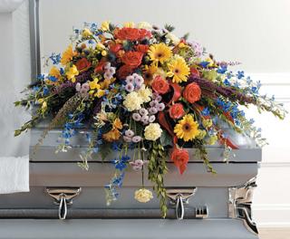 Colorful Half Casket Spray-CS15 - SKU: Funeral-26  Brightly colored flowers; roses, gerbera dasies, delphinium, mums, and heather create a perfect spray.