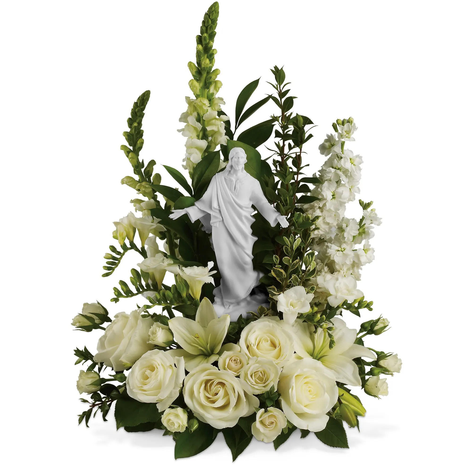 Teleflora's Garden of Serenity Bouquet - This exquisite porcelain sculpture of Jesus surrounded by radiant flowers will be a source of comfort to loved ones during a time of loss. Your thoughtfulness will be long remembered. The stunning bouquet includes white roses, stock, snapdragons, lilies and freesia accented with salal, myrtle and pittosporum. Delivered with a meticulously detailed porcelain sculpture of Jesus. Orientation: One-Sided Teleflora