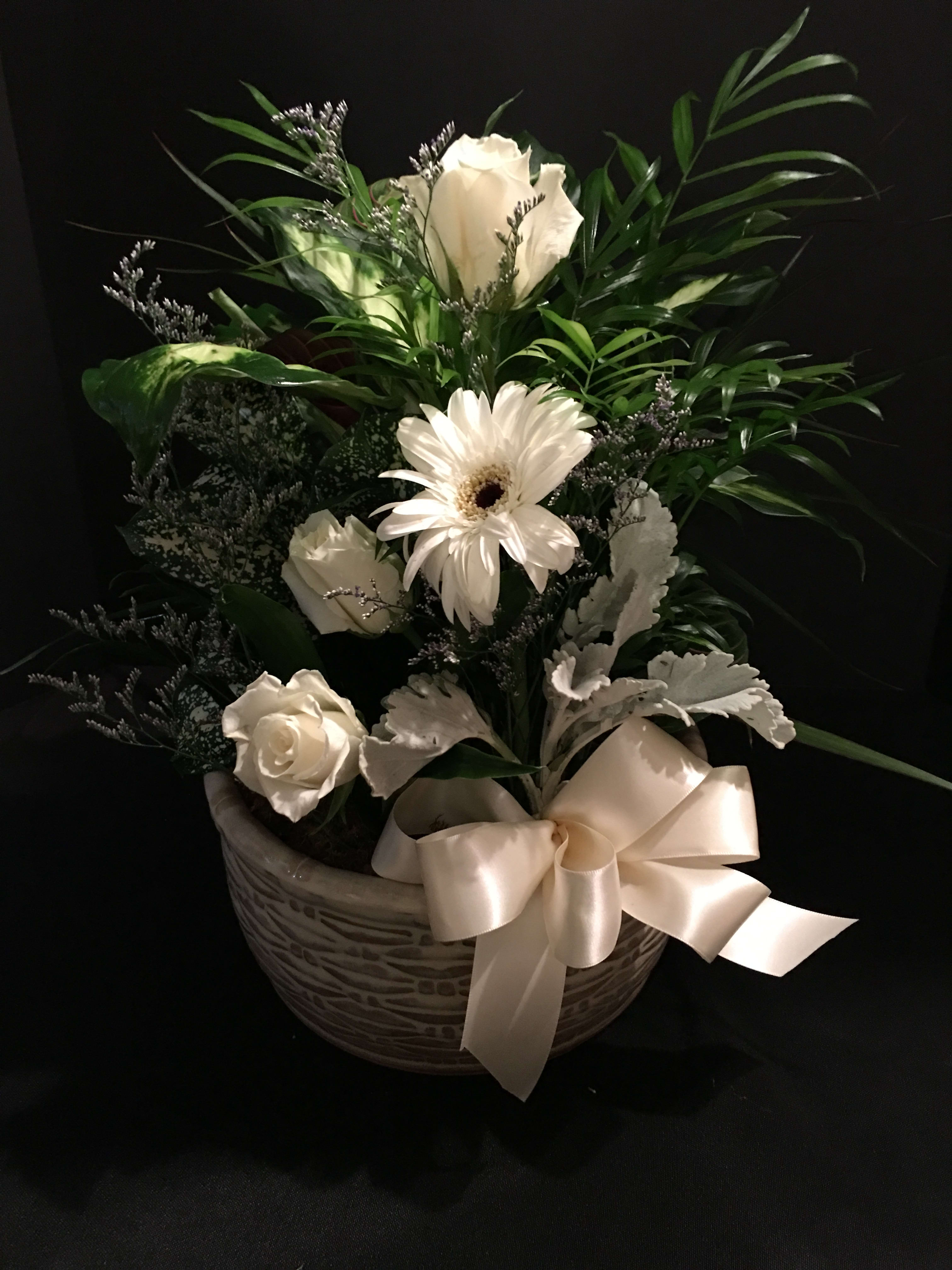 Simply Beautiful Dish Garden Simply Beautiful Dish Garden - 24x12 assorted 4 inch lands in a ceramic planter. Fresh flowers added for touch of color.