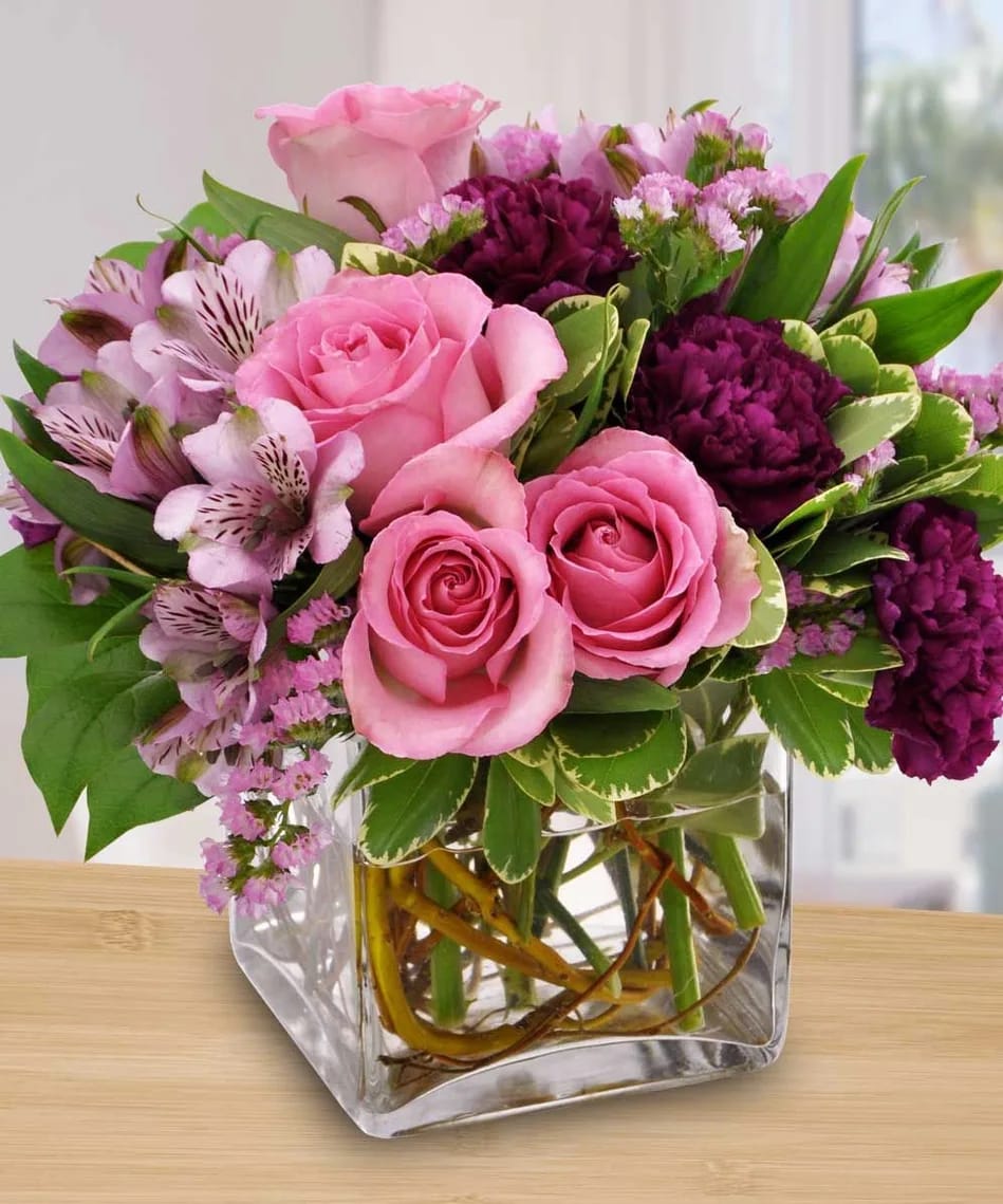 Lovely - This arrangement is perfect for someone who loves pink. Comes also with alstroemerias, roses and carnation.