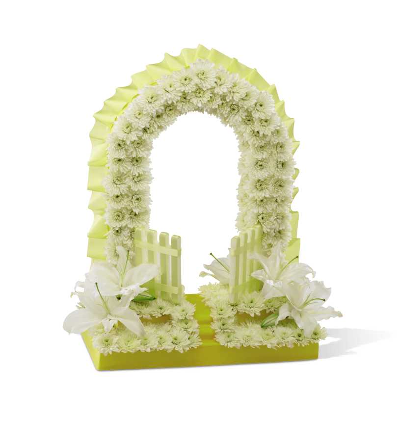 The Gates of Heaven - The Gates Ajar Tribute is a beautiful display of hope's eternal light. White chrysanthemums form the shape of heaven's gate accented with white Oriental lily blooms and lined with a bright yellow ribbon to create a warm and comforting display of enduring faith at their final farewell service. 30h x 22w