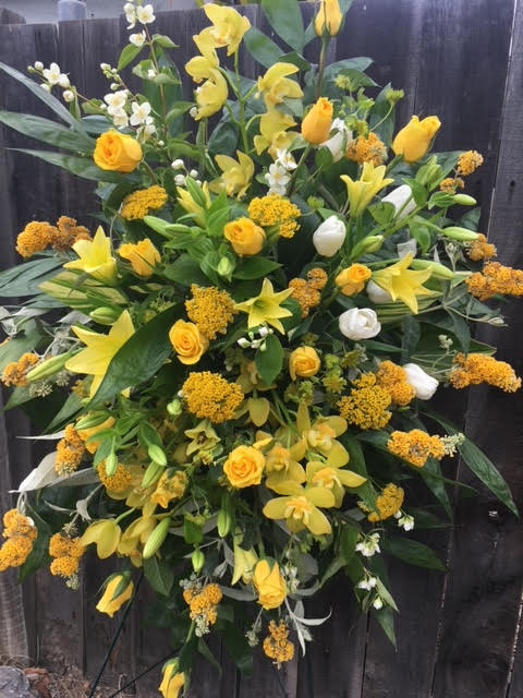 Sunny Memories - A beautifully colored remembrance arrangement.