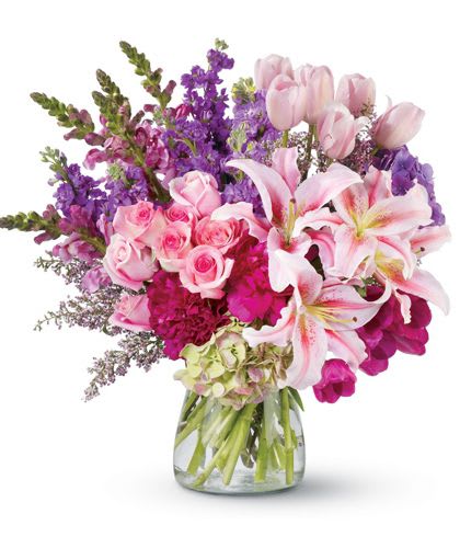 Royal Radiance - Nothing makes a grander impression than an enormous, gorgeous bouquet of fresh flowers. And this dramatic floral arrangement of roses, peonies, lilies, tulips and more – in radiant, blushing shades of pink and purple – is fit for royalty! It’s a remarkable gift that will be remembered forever.