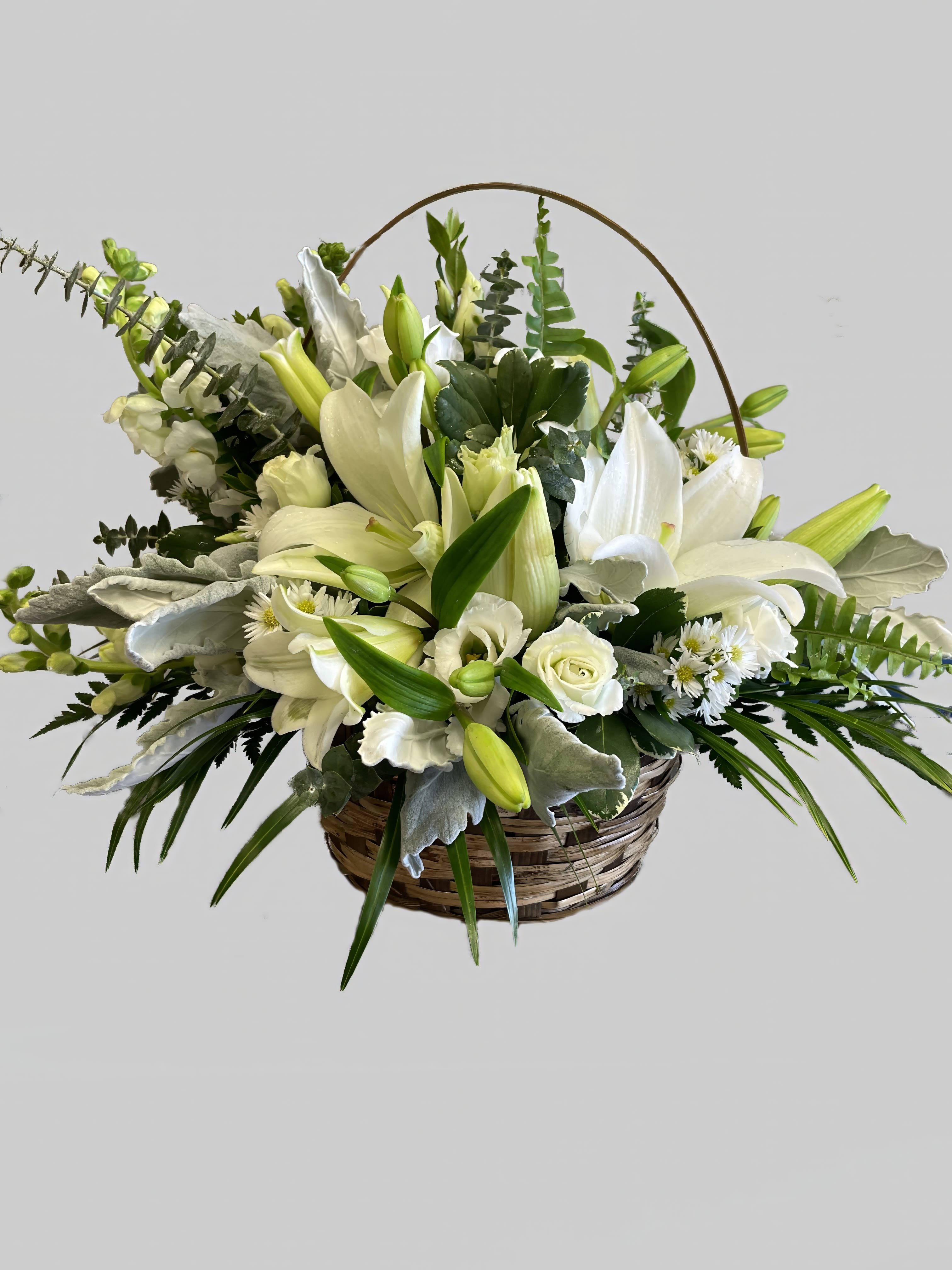 Basket of Roses &amp; Lillies  - This basket full of lilies, roses, lisianthus flowers and assorted greenery will work for any occasion. Color changes available for flowers. 