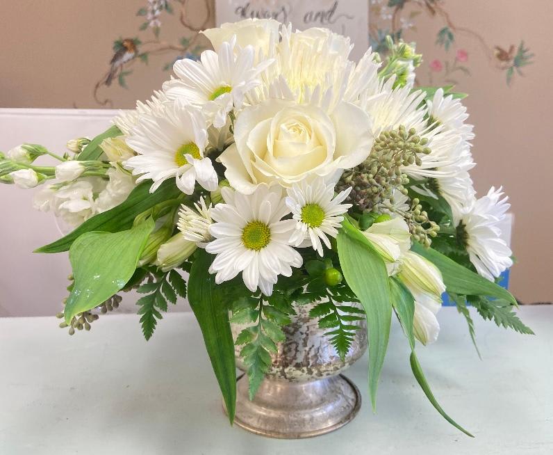 Simply Sweet - White daisy's and  white roses help make up this sweet arrangement in a metal pot. Works for any occasion.