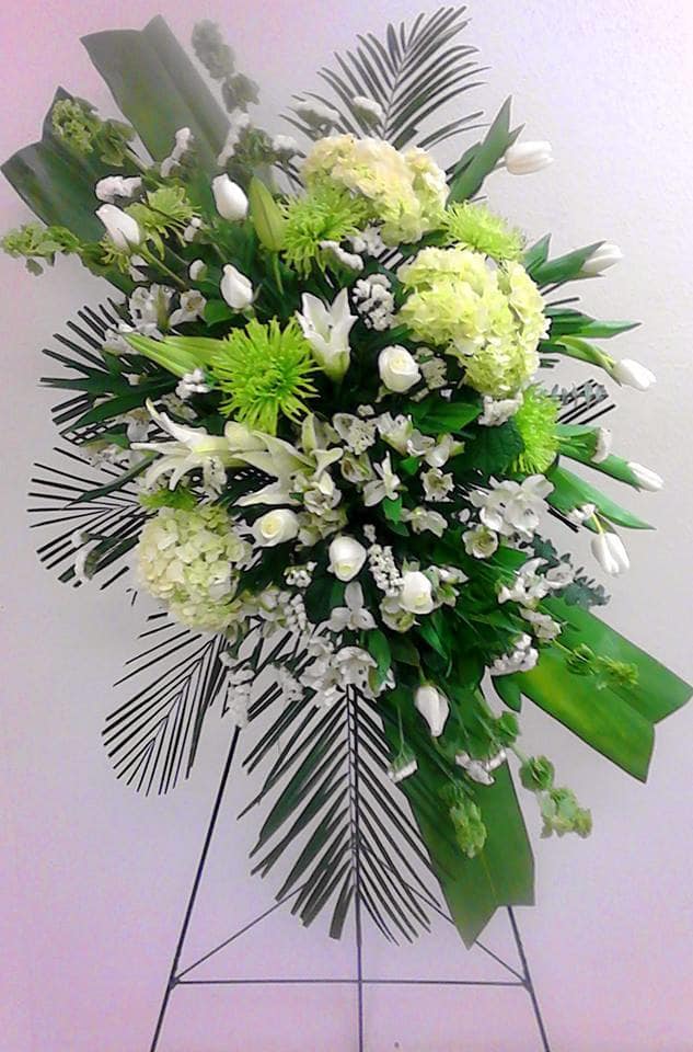 Pure elegance funeral spray. - Fresh floral.