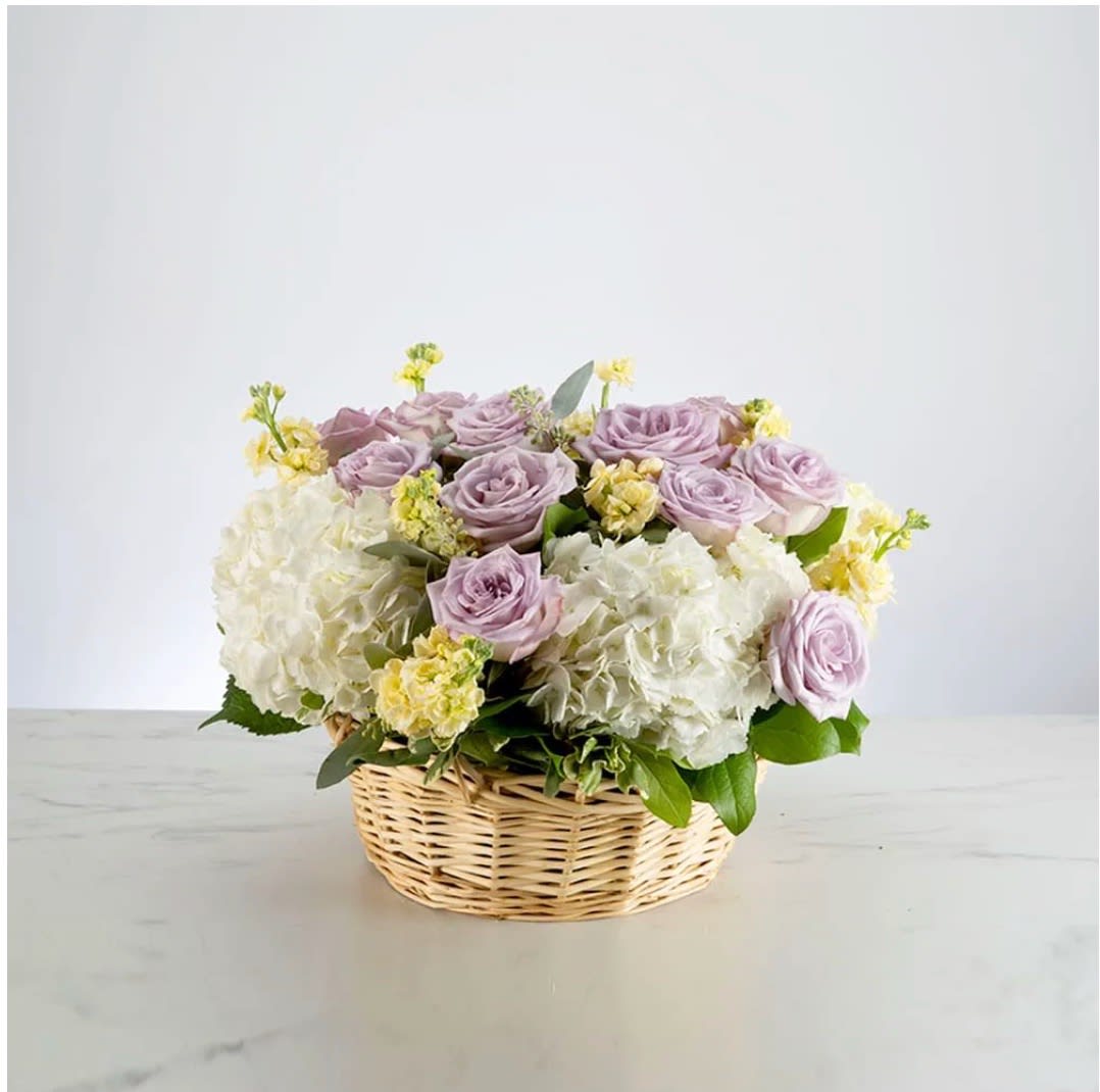 Offering Comfort by BloomNation™ Offering Comfort by BloomNation™ - A pastel flowering basket brings peace to any space. Send this beautiful basket to friends, coworkers or family during tough times to brighten any space and show how much you care.