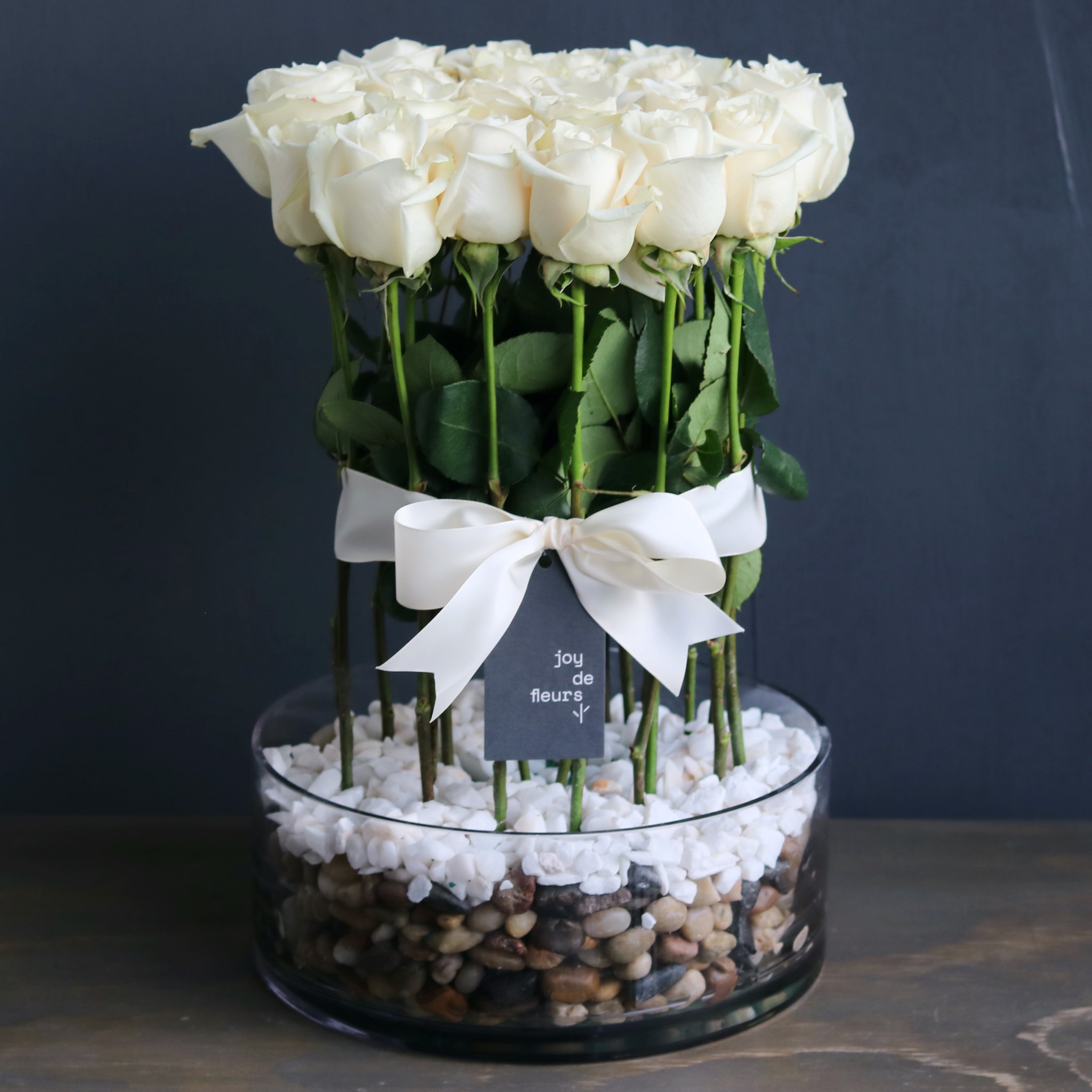 Happy Birthday! Vase with Beautiful Rose Flowers on Table Near White Brick  Wall Stock Photo - Image of event, petal: 221551430