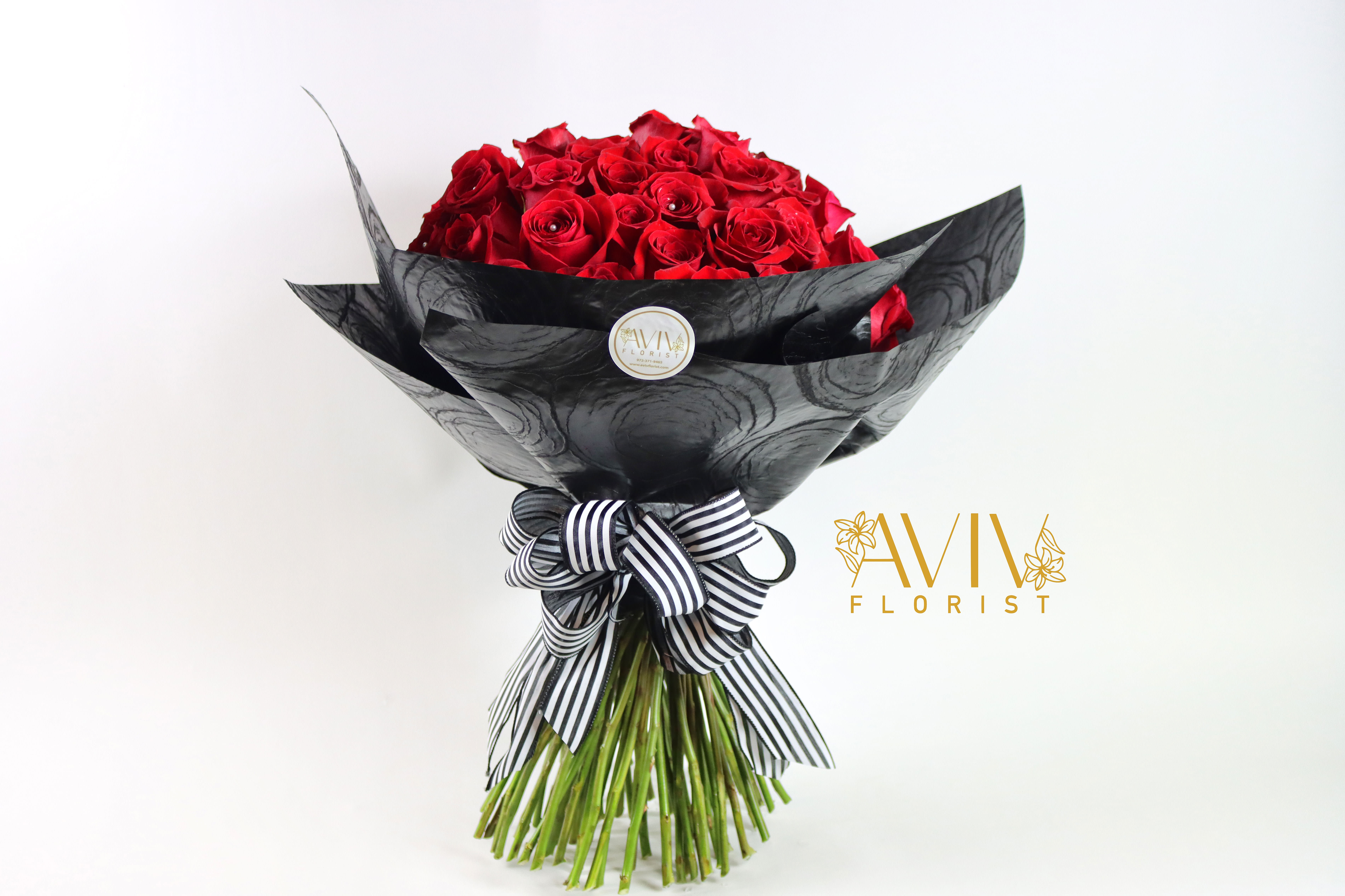 Ultimate Love 100 Roses Wrap - In Western culture, a 100-rose bouquet is seen as the ultimate romantic gesture, symbolizing unconditional love and devotion. Express your ultimate love with our beautiful Aviv Florist signature red roses wrap arrangement designed for that tremendous special moment.