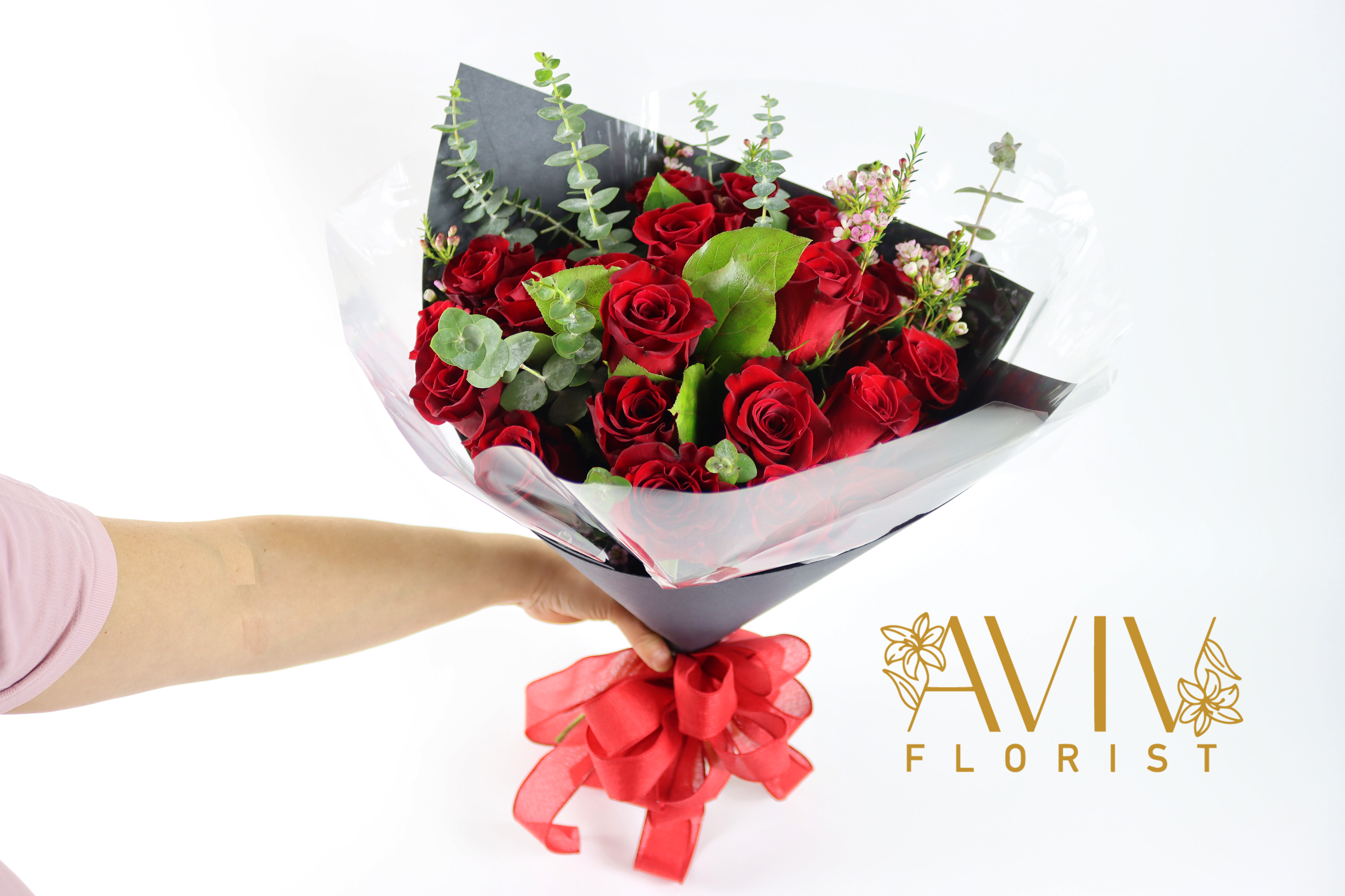  Ultimate 24 Love Roses Wrap - In Western culture, a 24-rose bouquet is seen as the ultimate romantic gesture, symbolizing unconditional love and devotion. Express your ultimate love with our beautiful Aviv Florist signature red roses wrap arrangement designed for that tremendous special moment.