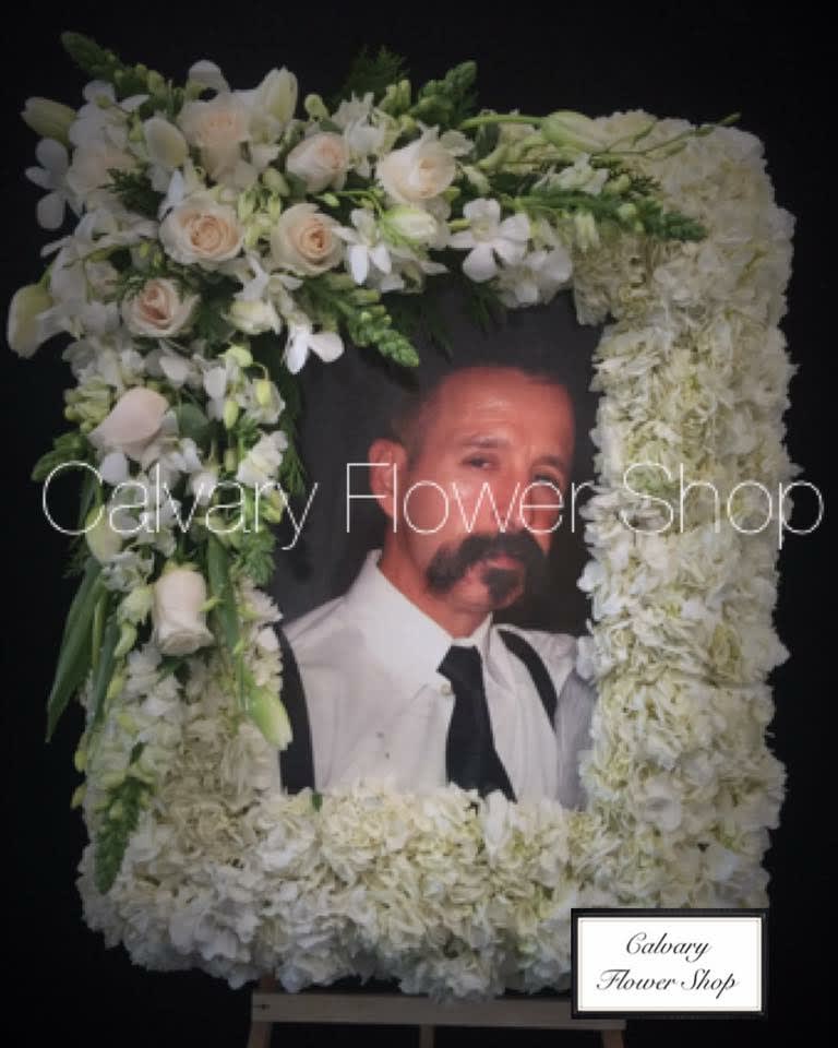 Photo Frame Sympathy Easel - A sympathy photo design, great for cremations and memorial services. Colors vary upon request.  Photo to be no larger than: 12 x 18 Photo is included in price.    Please call and provide photo image so we may process and create waterproof photo.