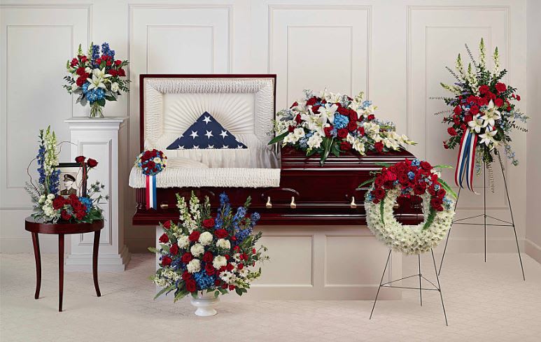 Distinguished Service Collection Distinguished Service Collection - Proud and patriotic, this collection of seven hand-made sympathy pieces honors a life of distinguished service with beautiful arrangements of red, white and blue blooms.