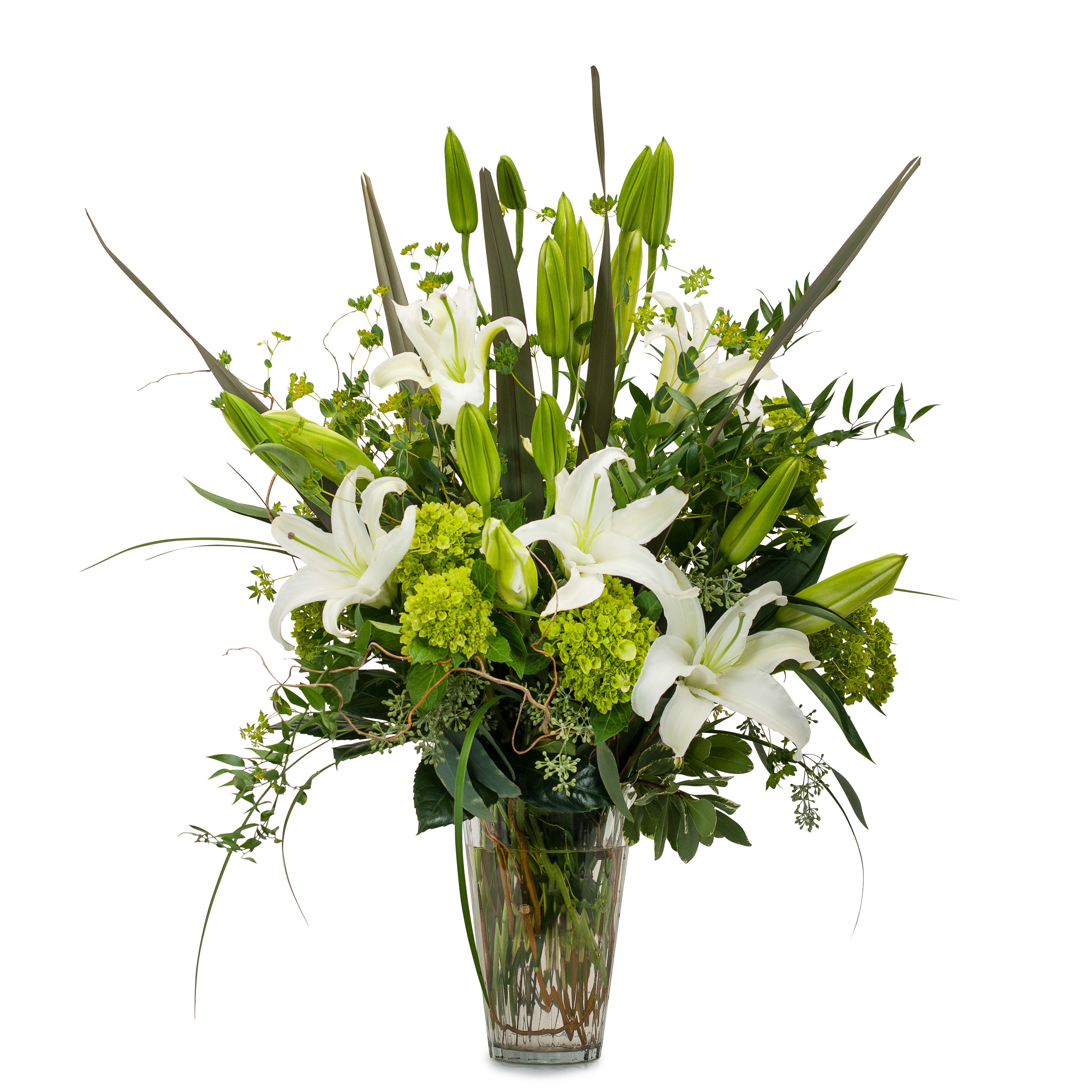 Naturally Elegant - A elegant combination of premium foliage, green hydrangea and hybrid lilies in a clear vase.	 