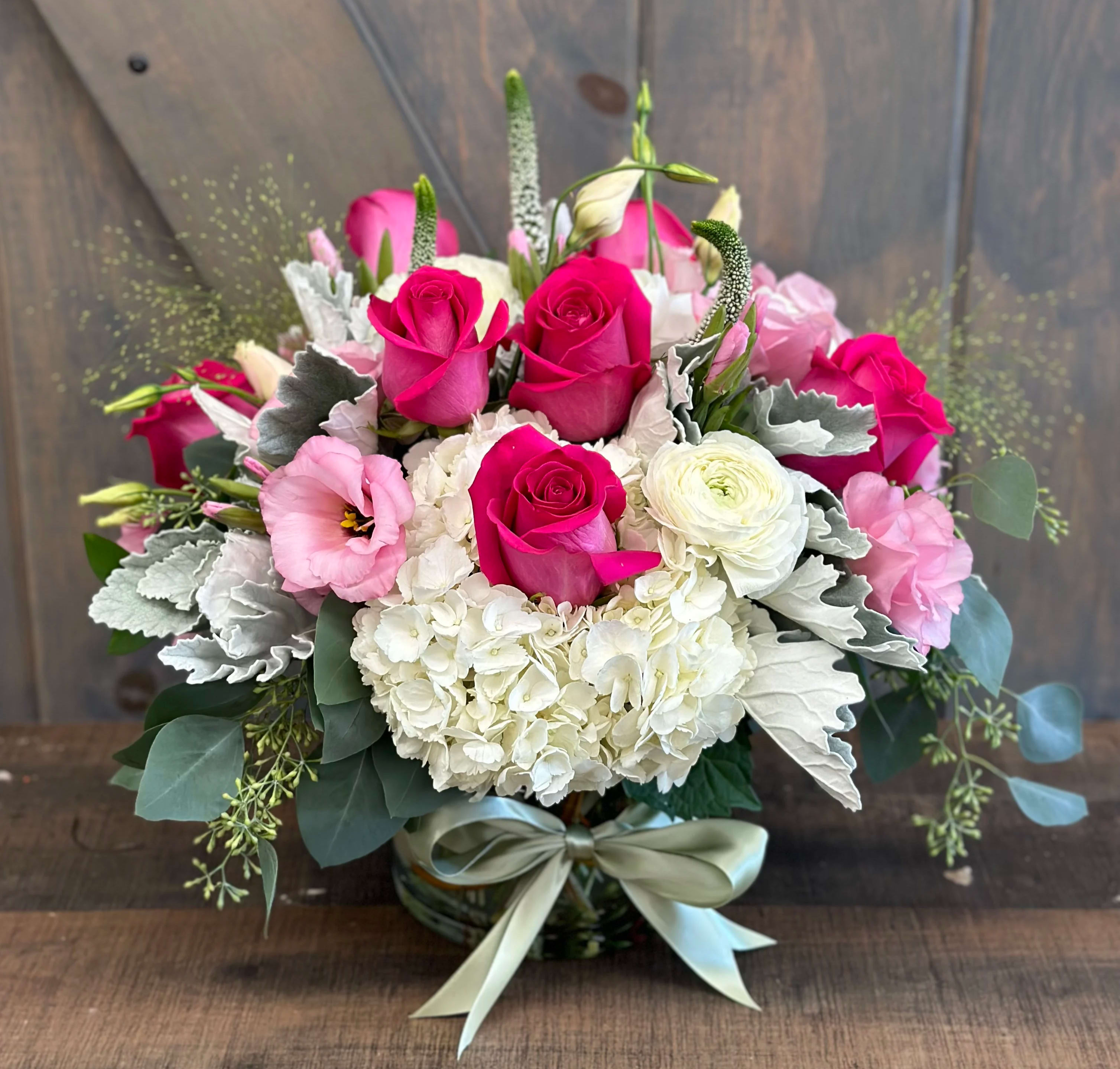 Pink Serenity - Included in this arrangement are Roses, Hydrangea, Lisianthus, Veronica, Ranunculus, Dusty Miller, Seeded Eucalyptus, and Explosion Grass