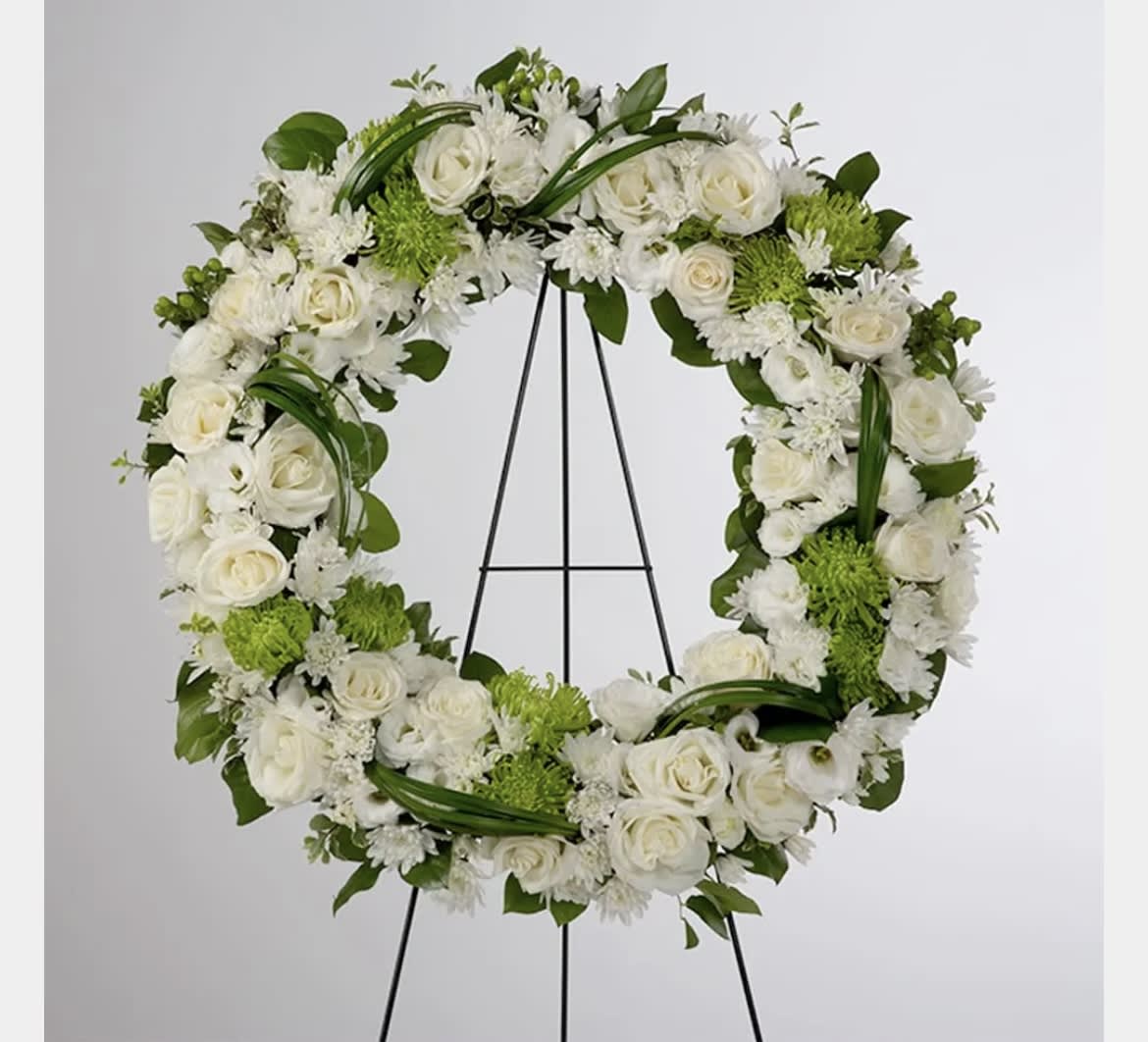 Lasting Serenity by BloomNation™  - A beautiful white and green tribute wreath that calms, this easel arrangement celebrates a full life and a peaceful passing. 