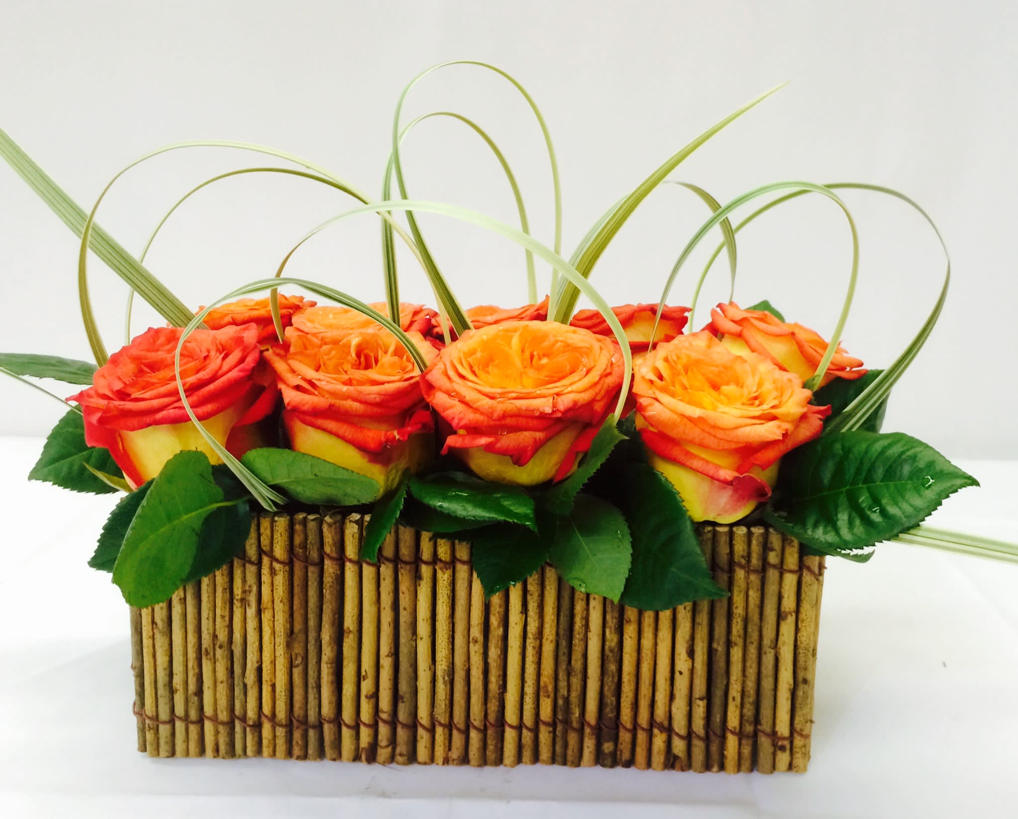 Juno - Modern design of two tone roses in bamboo tray. Can be a different colors.