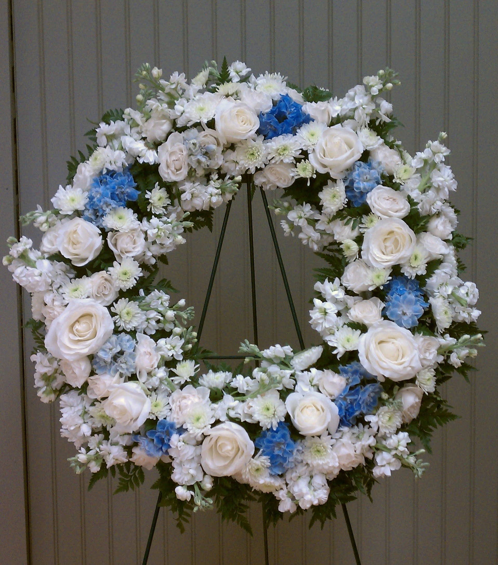 Peacock Blue & White Funeral Wreath Flowers