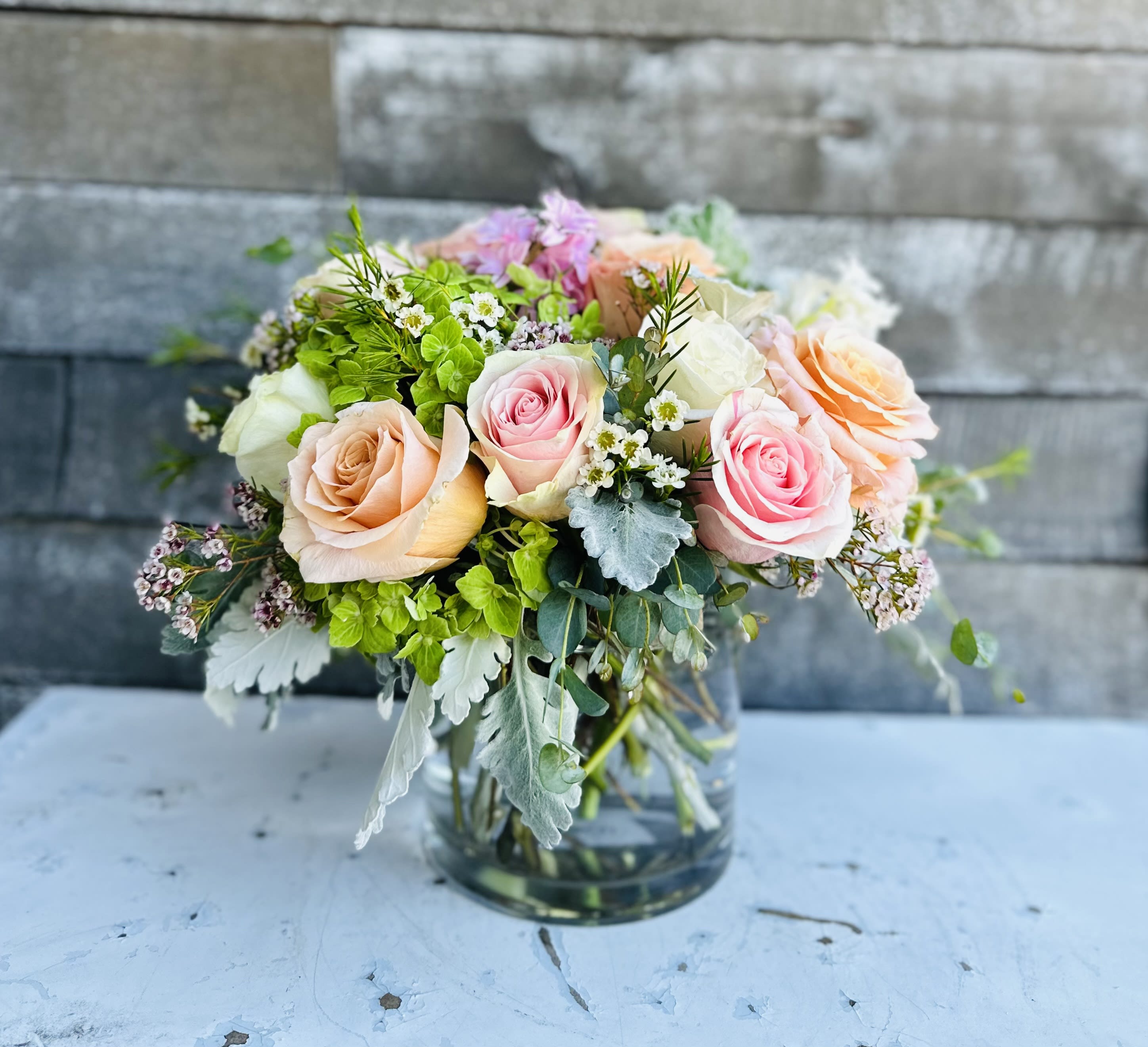 Summer peach  - Peach and white and green roses mixed perfectly in a clear glass vase